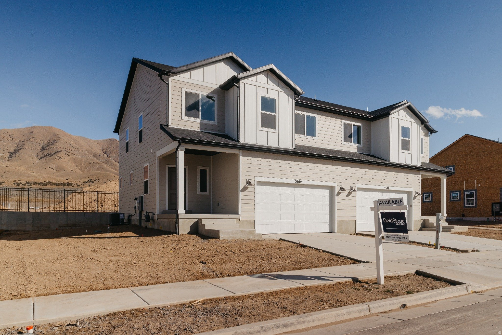 Quick Move-In End-Unit Opportunity in Cedar Grove  Parker Twinhome with Future Expansion!  This Parker floorplan offers 3 bedrooms and 2.5 baths across 2,442 sq ft with a bright, open-concept layout designed for modern living. The kitchen flows seamlessly into the dining and family room, creating a functional space for everyday living and entertaining, while large windows bring in abundant natural light. An unfinished basement provides room for future growth, and the end-unit location offers added privacy with a partially fenced yard ideal for outdoor enjoyment.  $21,145 In Upgrades Including a covered front porch, completed front landscaping, enhanced natural light with additional windows, and a spacious 2-car garage with extended driveway for extra parking.  Enjoy Cedar Grove amenities including a clubhouse, pool, dog park, tot lot, and 1 Gig fiber internet included with the HOA, all conveniently located near schools, shopping, and outdoor recreation.  Move in ready!
