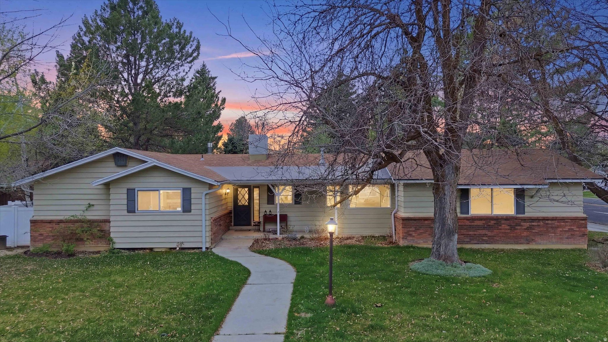 Located in the highly desirable Lundstrom Park area of Logan, just minutes from Utah State University, this beautifully updated home offers an open-concept great room featuring a remodeled kitchen with granite countertops, a large island, and a bright breakfast nook-perfect for everyday living and entertaining. The primary suite includes a remodeled ensuite bathroom, creating a private retreat. Enjoy year-round comfort with two furnaces and a tankless water heater. Additional highlights include two cozy gas fireplaces, a spacious deck for outdoor living, and a 2-car garage. Ideally located next to a bus stop for easy access to campus and downtown. Schedule a private tour today before it's too late!