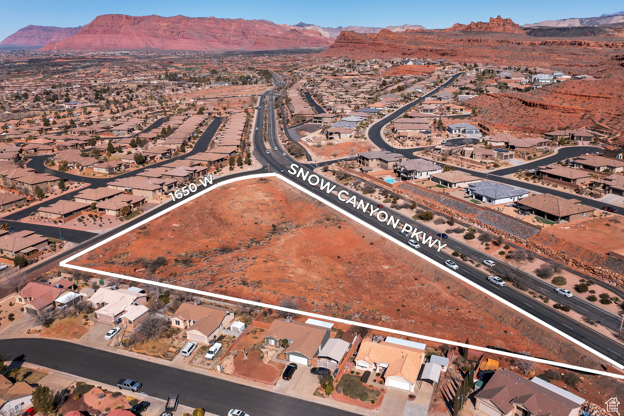 Rare 3.18-acre commercial corner at Snow Canyon Pkwy & 1650 W in St. George. Near $2B Black Desert Resort & Golf & Entrada. Strong demographics, high traffic counts & rapid growth make this a prime site for retail, office, mixed-use or hospitality.