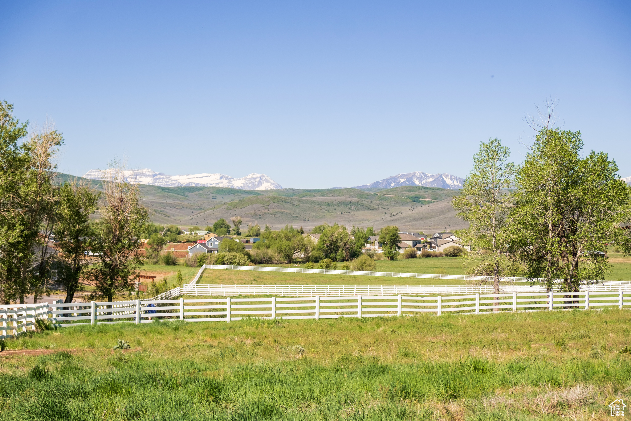 Discover a rare opportunity to own land in one of the most peaceful corners of Kamas Valley. Located just minutes from Park City, Stewart Estates offers only four 5-acre estate-style lots in a secluded yet accessible setting. These expansive parcels are equestrian-zoned and ready for your dream home - whether that's a mountain modern retreat, a legacy ranch, or a timeless farmhouse.  With sweeping views, open skies, quick river access, and a quiet landscape, Stewart Estates offers a lifestyle that's both grounded and inspiring. Wake to sunrise over the Wasatch Range and spend your days in connection with nature, family, and the land itself. This is a place for those who value space, freedom, and privacy - without sacrificing access to the amenities and energy of nearby Park City.  Developed by the visionary behind Wolf Creek Ranch, Stewart Estates blends thoughtful planning with natural beauty. With endless trails for hiking and outdoor recreation, an elegant entry monument, and perimeter fencing add to the neighborhood's character and charm.  Whether you're seeking open land for horses, a basecamp for outdoor adventures, or a peaceful place to build your forever home, Stewart Estates offers a one-of-a-kind chance to live with intention in a truly special setting.