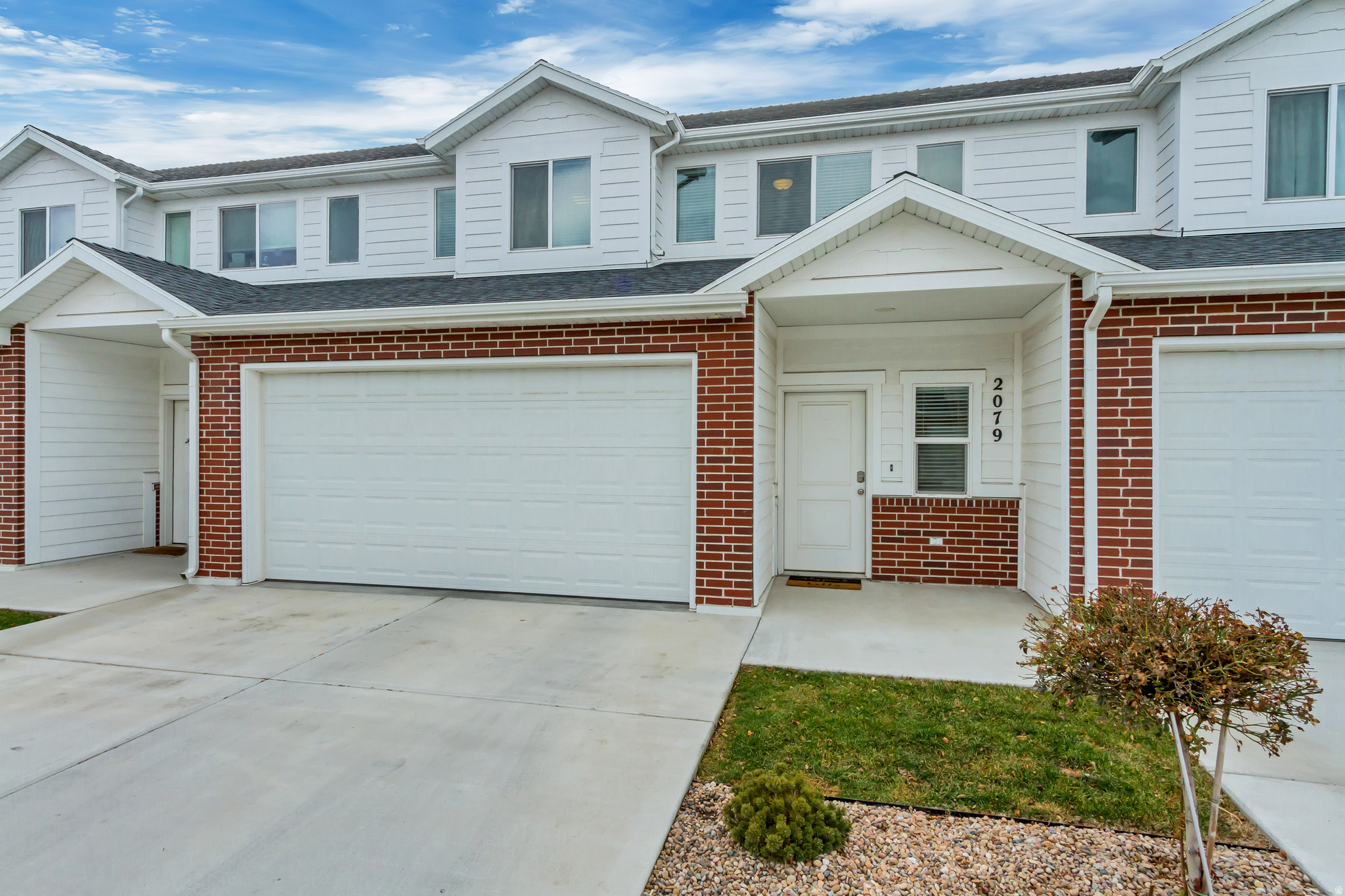 Better than new, this beautifully upgraded townhome features a well-designed, open, and spacious floor plan. The bright, connected kitchen, living, and dining area includes a walk-in pantry and flows seamlessly to a rear covered patio-perfect for relaxing. The oversized primary suite offers a walk-in closet, while both full bathrooms feature large double-sink vanities. Ideally located near the front of the community for easy access