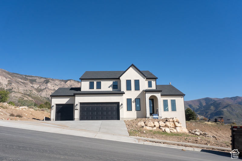 Seller is offering a preferred lender incentive, 7 year adjustable rate mortgage (7 year ARM) with rates as low as 4.875% for qualified buyers. This home has it all - custom kitchen cabinets, a tankless water heater, an additional furnace for the second story, a study on the main floor, and a three-car garage - all situated on a spacious lot. Views of Ben Lomond Peak along with the valley below, with close proximity to downtown Ogden, Pineview Reservoir and Snowbasin. Square footage figures are provided as a courtesy estimate only and were obtained from builder plan set. Buyer is advised to obtain an independent measurement.