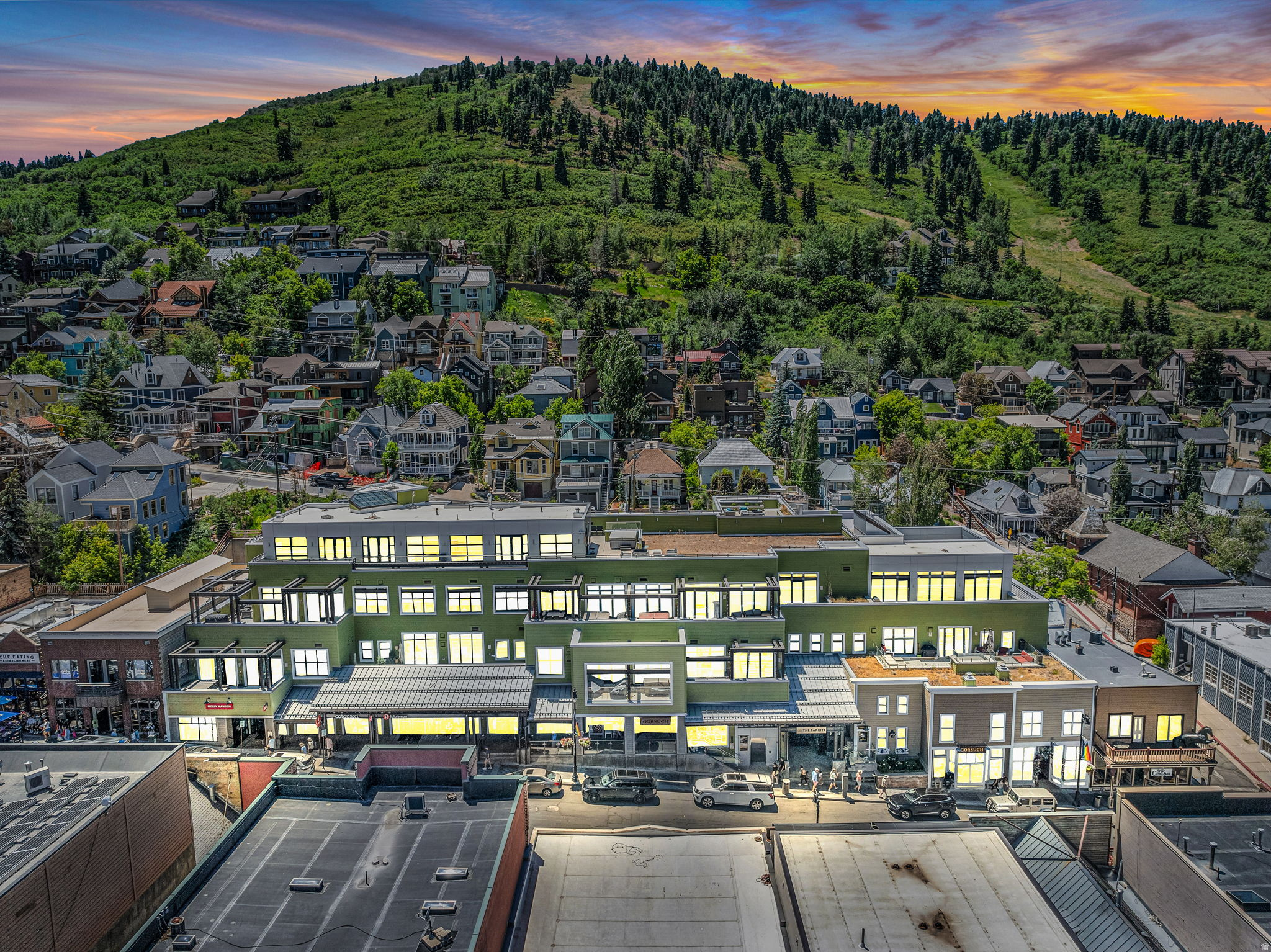 Located in the heart of Park City's Historic Main Street, The Parkite offers a unique collection of 15 exclusive residences, offering a rare combination of style, location, function, and amenities. Residence #10 offers an open floor plan, including a gourmet kitchen, three luxurious suites, living room, and a large media room that functions well as a flexible living or sleeping space.  As one of the few units at the Parkite, this residence has a large private heated outdoor deck with a hot tub. Have your morning coffee and enjoy epic views of Main Street, historic Old Town, and the Egyptian Theater. Buckle on your ski boots, grab your skis, and hop on the free Trolley that takes you to the Townlift for skiing. Additional amenities at The Parkite include a private large walk-in storage in the garage, one dedicated parking space, a gym, a dedicated ski locker, and an additional common area rooftop deck with a barbecue station and 360-degree views of historic Old Town. Enjoy exclusive dining and shopping right outside your door. Skiing is a short distance away, and Salt Lake City International Airport is 35 minutes away.