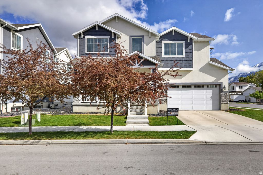 Beautiful 4-bedroom, 3.5-bath twin-home ideally located near BYU, UVU,  the Provo UTA Station, and quick freeway access for effortless commuting. Situated on a quiet street on a corner lot with ample parking, this home offers both convenience and comfort. Thoughtfully designed with modern finishes, spacious living areas, and abundant natural light throughout. Perfect for owner-occupants or investors seeking strong rental appeal in a highly desirable Provo location.