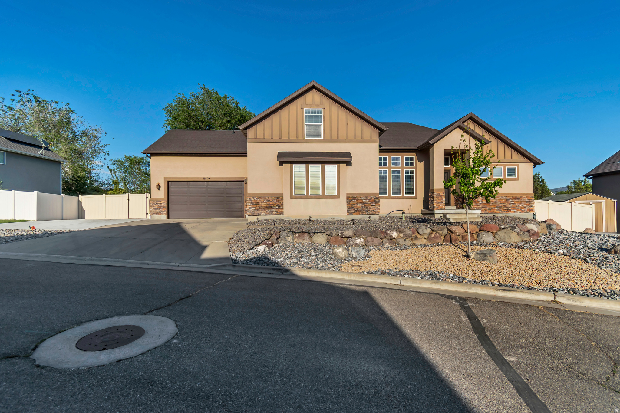 New Paint and New Price!  This stunning 2-story home built in 2011 offers the perfect blend of thoughtful design, generous space, and everyday functionality. From the moment you step inside, soaring vaulted ceilings and brand-new laminate floors set the tone for a home that feels both grand and welcoming. The heart of the home is a beautifully appointed island kitchen featuring abundant cabinetry and a truly impressive pantry - complete with a coveted direct-access door from the garage, making those big warehouse store hauls a breeze. Also on the main floor, the oversized primary suite offers a true retreat, with a double shower, double vanity,  and walk-in closet. There are 3 large bedrooms upstairs that give everyone the space they deserve. The walkout basement is flooded with natural light, and opens up a world of possibilities for entertaining, a home gym, guest quarters, or a recreation room. Outside, a spacious backyard provides plenty of room for play, gardening, or summer gatherings. The location couldn't be better - you're minutes from top-rated shopping, popular dining, and quick freeway access, making errands and commutes effortless. The great room, stairwell, and kitchen, including all ceilings, are being painted! Sellers will provide a Max Plan one-year home warranty from First American Home Warranty.