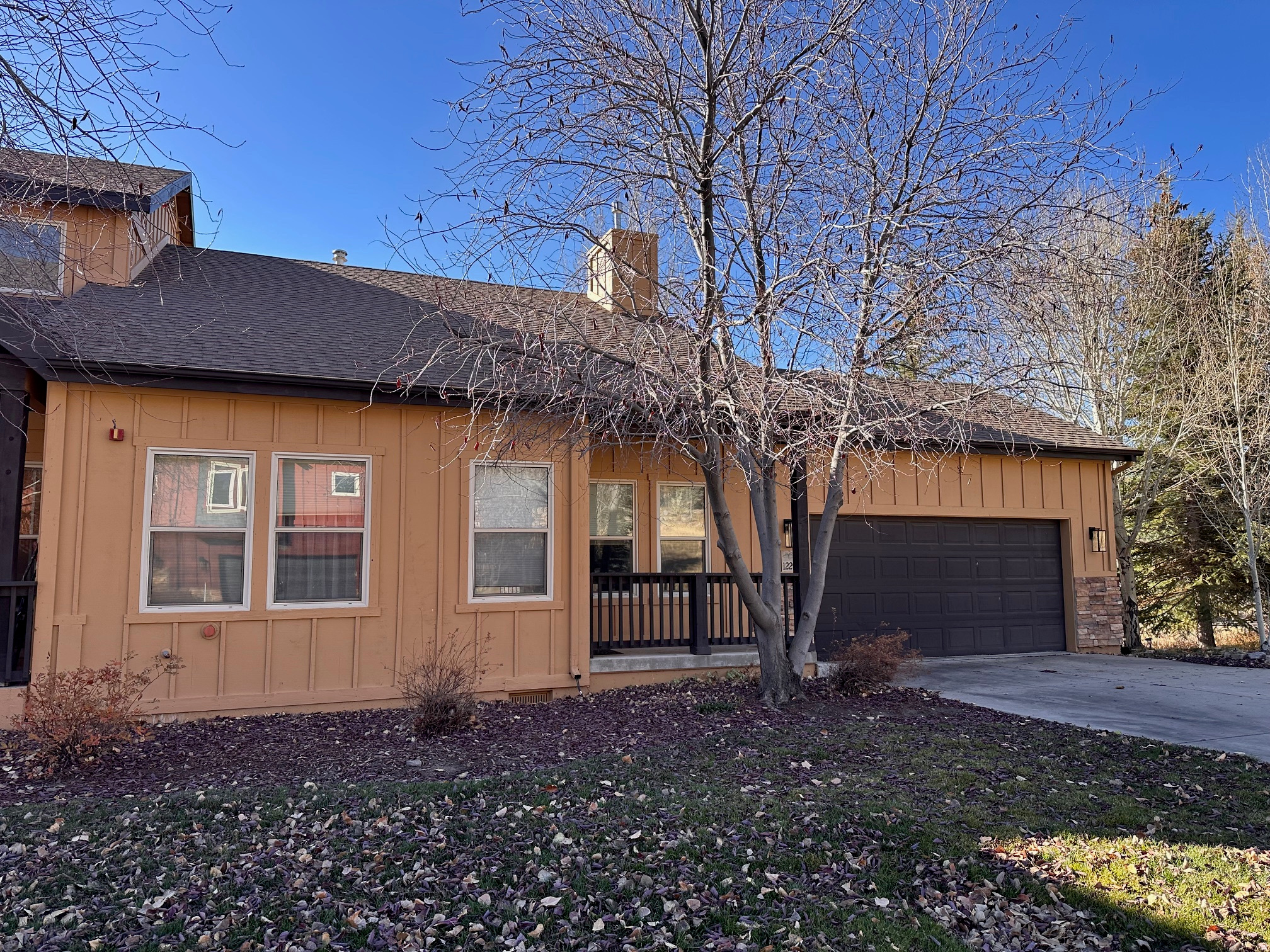 BRAND NEW ROOF JUST INSTALLED! All assessments PAID! One of the lowest price per sq. ft. in the area!Quiet established neighborhood with breathtaking views of Deer Valley & Jordanelle. One of the lowest price per square foot in Park City & priced to move! Designated open space right out your back door, this home invites modern mountain living. Unlike all the new developments in the area, this townhome is in an established neighborhood where the master plan was not to pack as many homes as possible into a small piece of land. The homes are well spaced, with mature landscaping, and the majority of the lots have been built so no perpetual construction. The living room is enhanced by a slate- tile gas fireplace & vaulted ceilings with views for miles. The primary bedroom has updated herringbone-patterned wood flooring, a walk-in closet, and a well-appointed full bath. The lower level reveals a huge family room, with bedroom & an updated bathroom, connecting to a the walkout covered patio. Additional features include plenty of storage space, an outdoor closet for tools and games in the backyard, a finished attic storage space complete with shelves, and wired for an electric car charger. Dog-friendly yard & neighborhood, plus close proximity to hiking/biking trails & recreational destinations. Just minutes away from all the outdoor activity Park City has to offer. HOA maintains common area, front landscaping & picnic area. Buyer to verify all.