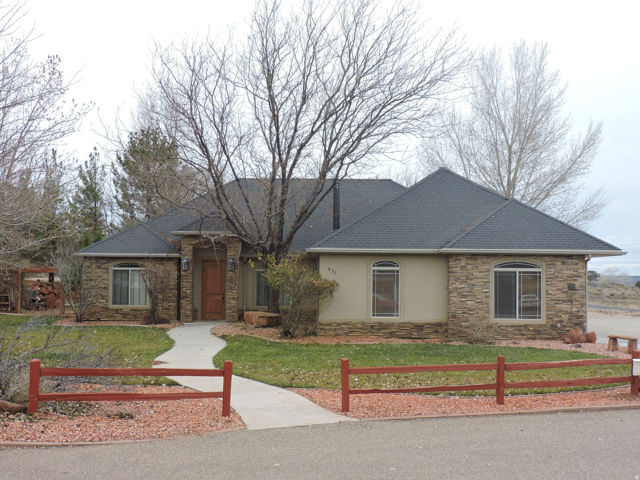 Your search is over! This large, beautiful custom-built home includes a huge shop building with plenty of room to store your tools, outdoor toys, vehicles, RV, boat, tractors, etc. Come and tour this gorgeous one-level 3163 Sq Ft home on 1.22 acres. It has 4 Guest Bedrooms, 2 Full Guest Bathrooms, 1 Master Suite with a large On-suite Bathroom with a large walk-in/walk-thru Closet. Enjoy a little privacy with 3 of the 4 Guest Bedrooms being located on the other side of the home from the Master Suite. It also has an oversized Laundry/Craft Room, walk-in Pantry, a wood burning stove in the Family Room, and a propane fireplace in the Living Room. Includes an On-demand Generac Generator, patio hot tub, large garden shed, 4 raised bed garden planters with drip system. PLUS, a HUGE detached 4224 Sq Ft Shop Building with an office, 2nd story storage, and 1/2 Bathroom, as well as a 50-amp RV hookup and dump station. If you have horses no worries...there is room to install corals for them too. Add a chicken coop & chickens too. Landscaping includes lots of mature trees, large rocks, and a front yard rock waterfall. All driveways around the property are concrete or gravel. Buyer to verify all.