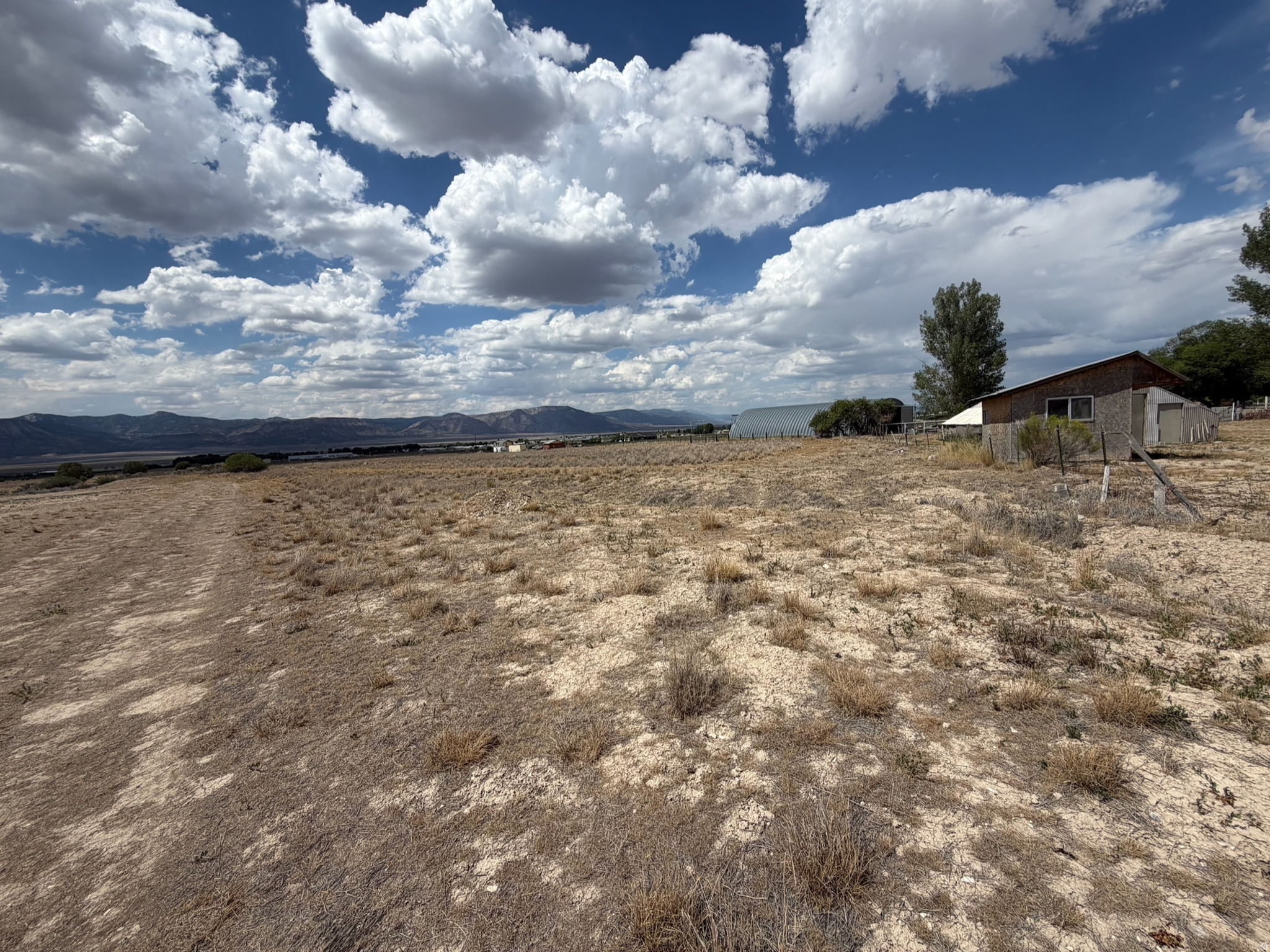 Located just off of 300 East, this parcel is located in the RA2 zone and includes 1 acre ft. water right; Access is off of 300 East and onto  a private road that has been approved by the county and will be deeded at settlement. Google coordinates:  9.33056, -111.58083.