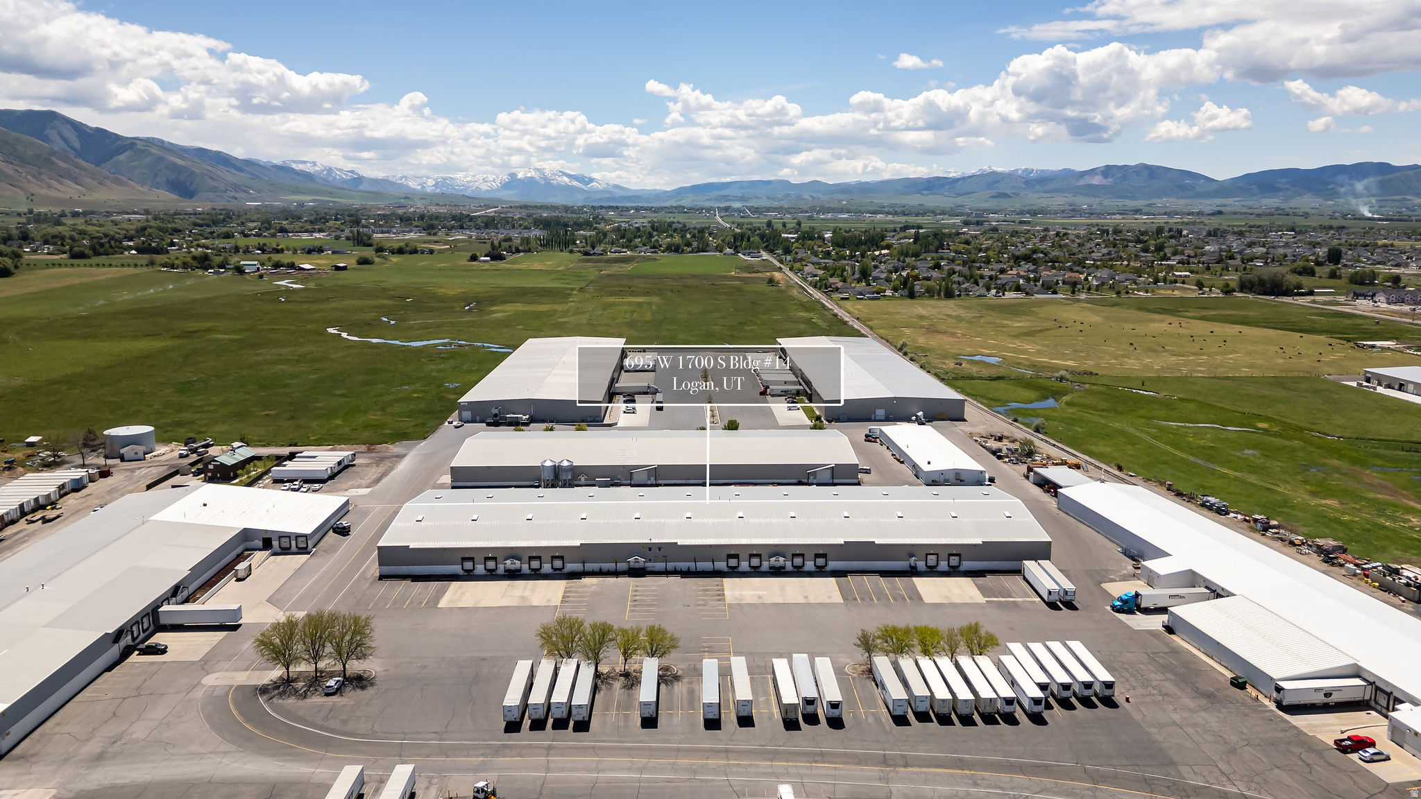 76,200 sq ft of Industrial Warehouse/Manufacturing space available with Truckers Entrance, Office Space, & Lounge/Breakroom located near Hwy 89-91 in the South Logan Area.  Building features 10-9ft x 8ft Dock Doors & 5-14ft x 14ft Ground Level Doors.  There is enough parking for approximately 40-50 vehicles or 35 Tactor Trailers.  Additional Tractor Trailer Overflow Parking is available with the capability of handling approximately 200 Tractor Trailers.  This Industrial Park has a lot to offer its Resident Business's with the many Possibilities & Opportunities for Future Grow & Expansion with the Additional Available Dry Space, or Additional Dry Space that can be Built.  Refrigerated Space Coming Soon! This Industrial Park also has the capability of being able to solve many temporary, short term, or seasonal issues business's often encounter with onsite equipment rentals, & its Short-Term Single Pallet Storage options!  Information is provided as a courtesy only, lessee & lessee's agent to verify all info!
