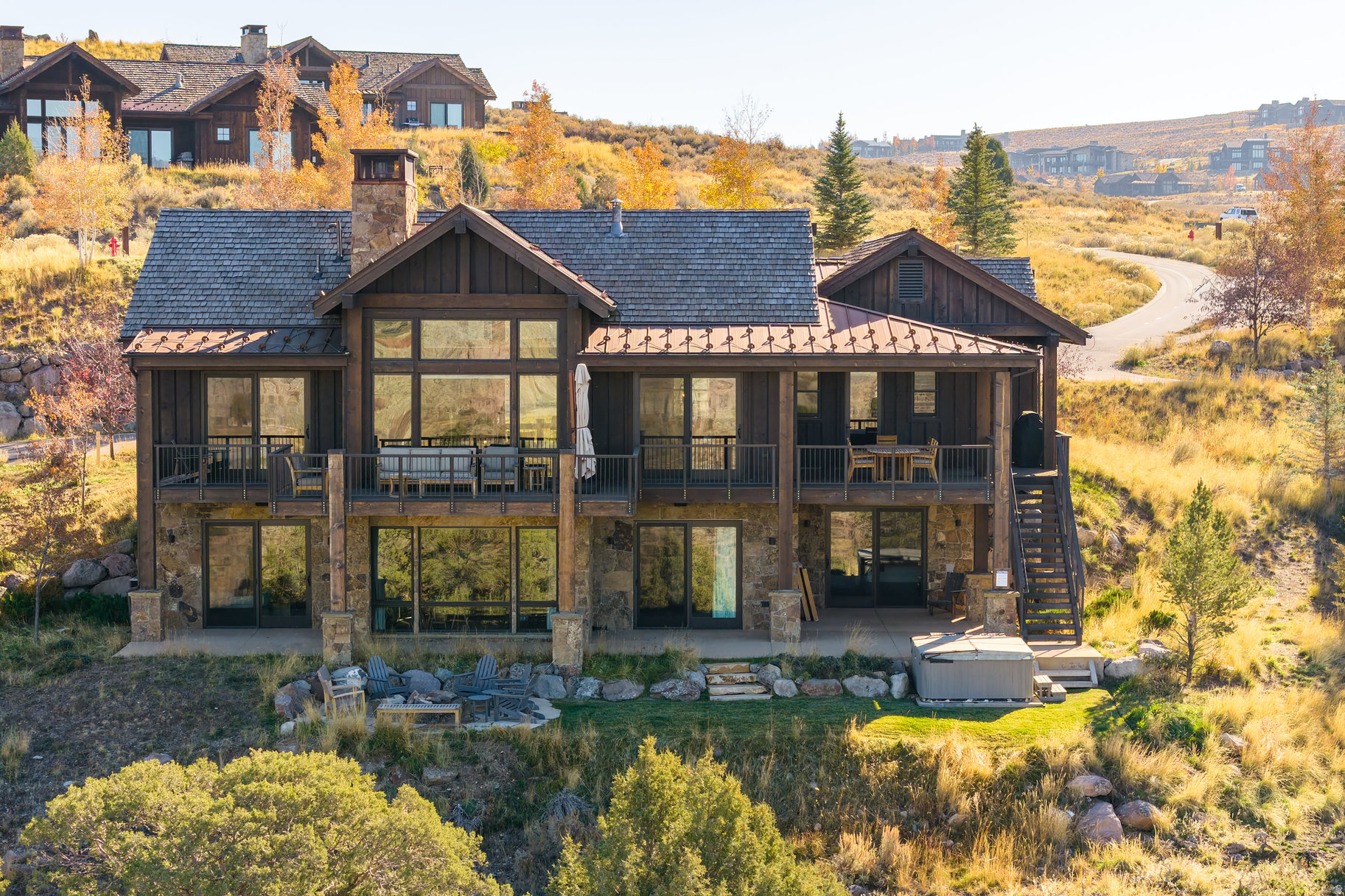 Experience breathtaking, unobstructed views of Deer Valley, the Victory Ranch golf course, Rock Cliffs, and Juniper Draw from this stunning cabin home. Spanning 3,337 square feet, this 4-bedroom, 4.5-bath retreat blends timeless mountain architecture with modern comfort. Centrally located to all 3 amenities, this home includes an extensive stone privacy wall along the east side of the driveway and is perfectly positioned to capture sweeping vistas of sprawling open space and the connecting trail to Juniper Draw and the Victory Ranch ropes course. Inside, enjoy rustic yet refined finishes and thoughtful upgrades throughout, including Duchateau hardwood flooring, a Lutron system for automated shades, pre-wired audio and media, zoned heating and cooling with Nest thermostats, and heated bathroom floors for year-round comfort. The spacious 2-car garage features epoxy flooring, ideal for both storage and gear. Whether gathering with family or entertaining guests, this Victory Ranch cabin delivers an exceptional mountain lifestyle defined by comfort, privacy, and panoramic beauty. Victory Ranch is a private, four-season community of 6,250 pristine acres along four miles of the Upper Provo River. Amenities include an 18-hole Rees Jones golf course, brand new golf clubhouse, world-class fly-fishing, miles of mountain biking and hiking trails, 5-stand shooting facility, 4x4 adventures, snowmobiles, ice skating rink, backcountry yurts, fishing ponds, multiple restaurants, ski access lodge in Park City and more than 3,500 acres of untouched backcountry. The Post Clubhouse includes our concierge team, heated pool, hot tubs, fire pit and seasonal grill. The Barn features a Pizza and Ice Cream Parlor, Art Studio, Game Room and Indoor Basketball and Sport Court as well as a Fitness Center, and Spa. The swimming pool, waterslide, tranquil stream and pond, tennis, pickle and paddle courts, and event lawn will be sure to provide hours of family fun. The new Golf Clubhouse restaurant, event space, simulator, and pro-shop are now open. Victory Ranch is approximately 15-minutes from Deer Valley and 25 minutes to Park City.