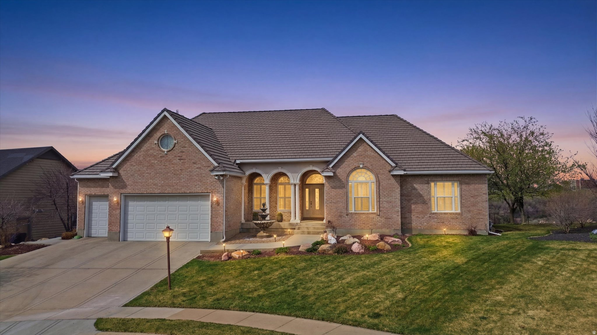 I absolutely LOVE this home, and I think you will too. First of all, the views are stunning. You could spend hours every day on the back patio soaking up the beauty! The next stand out is the extremely high quality of everything about this home. Crown Moldings everywhere, tray ceilings, coffered ceilings in office, extensive woodwork, Leaded Glass Transoms, brick exterior, High end Bar Tile Roof, wired for external power generator. This was a Parade of Homes home. Sellers just updated all the appliances and put in new Quartz countertops in the kitchen. The basement is huge and perfect for parties or large gatherings, and the party can spill out into the yard with the walk-out basement. Call today for your private showing.