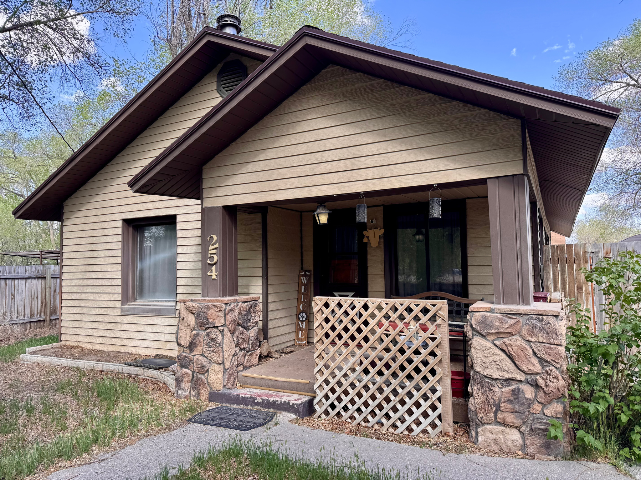3 Bed/1bath, single level home with woodburning stove in addition to the forced air gas furnace. Fenced yard has multiple patios, gathering spaces and sheds. Large trees provide tons of summer shade. Includes corrals and horse stalls that could also be used as covered vehicle parking. Kitchen appliances are included.