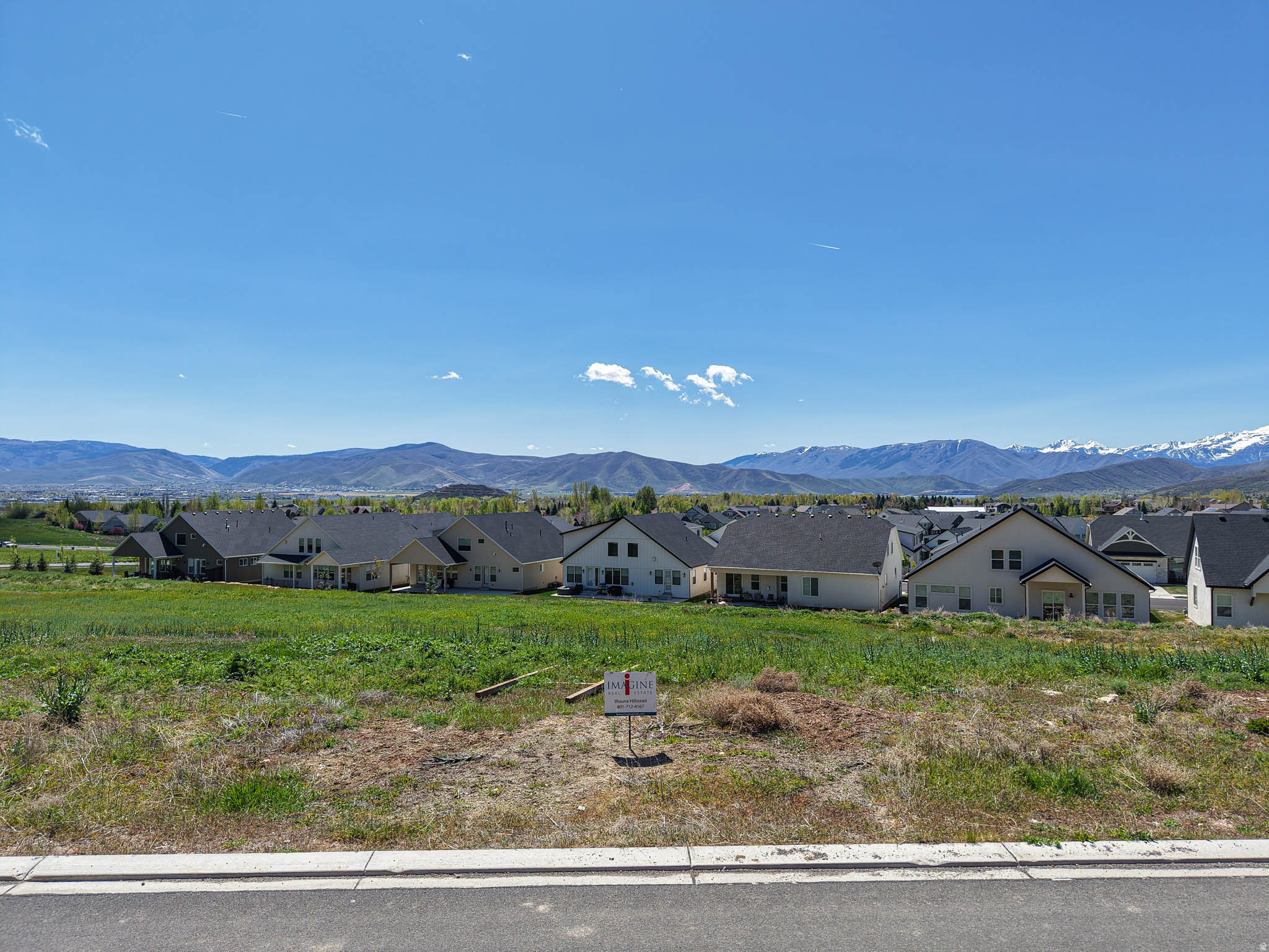 Lot #9.  The breathtaking location boasts panoramic views of historic farms, Snake Creek Canyon, Deer Creek Reservoir and the majestic Mount Timpanogos.  Located in Midway's most exclusive subdivision -- The Reserve.  This exceptional, exclusive location offers the serenity one desires in luxury living.  Amenities include miles of walking trails, sports court, pool, viewing deck and family gathering places.  The Heber Valley has become a mecca for summer and winter recreation.  It's also the gateway to the High Uintas and backdoor to the Wasatch Range.  And it's just minutes to Deer Valley East Village, Sundance and Park City resorts.  Don't miss this extraordinary opportunity to own this stunning, gorgeous lot in The Reserve -- a fully designed and planned community consisting of 48 custom estate homesites surrounded by 30 acres of lush open space. This lot has a gradual slope and is perfect for a walk-out basement.  House plans are included with the purchase of this lot.  The architect is Rich Cliften of Clif10 Design.