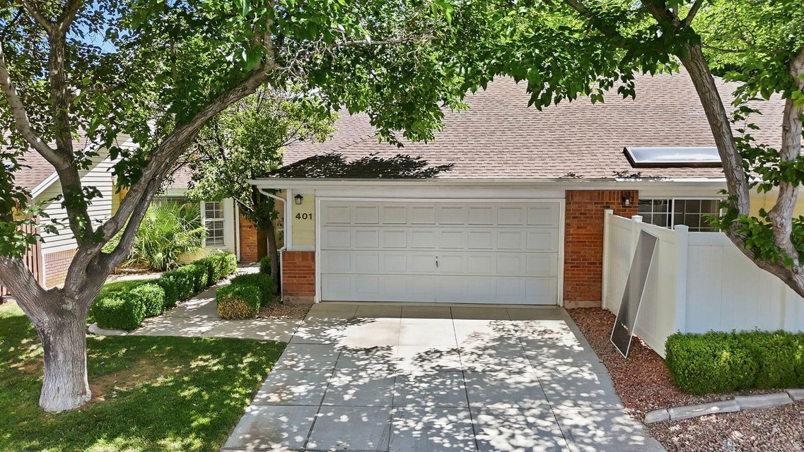 Beautifully maintained Canyon View townhouse offering 2 bedrooms, 2 bathrooms, plus a versatile office/den that could easily serve as a third bedroom. Pride of ownership is evident throughout this move-in-ready home featuring new flooring, fresh paint, updated kitchen countertops, appliances including oven, microwave, dishwasher, sink and faucets, , updated bathroom countertops, and a newly remodeled guest bathroom shower. The functional floor plan provides comfortable living space with abundant natural light and a welcoming atmosphere. The oversized 2-car garage includes an extra-deep parking bay, providing valuable space for larger vehicles, storage, a workshop area, or outdoor recreation equipment. Located in the desirable Canyon View community, this home is surrounded by mature trees, beautifully maintained grounds, and attractive brick exteriors that contribute to the neighborhood's timeless appeal. Built in 1985, Canyon View is known for its quiet setting, well-kept common areas, and convenient location. The HOA offers exceptional value at just $275 per month and includes common area maintenance, exterior building insurance, exterior building maintenance, roof maintenance, private roads, full yard maintenance, and access to community amenities including a swimming pool and hot tub. Conveniently located near Sunset Boulevard, you'll enjoy quick access to shopping, restaurants, grocery stores, medical facilities, parks, walking trails, and many of St. George's most popular amenities. Whether you're looking for a full-time residence, seasonal getaway, or low-maintenance investment property, this meticulously cared-for home offers comfort, convenience, and exceptional value in one of St. George's established communities.