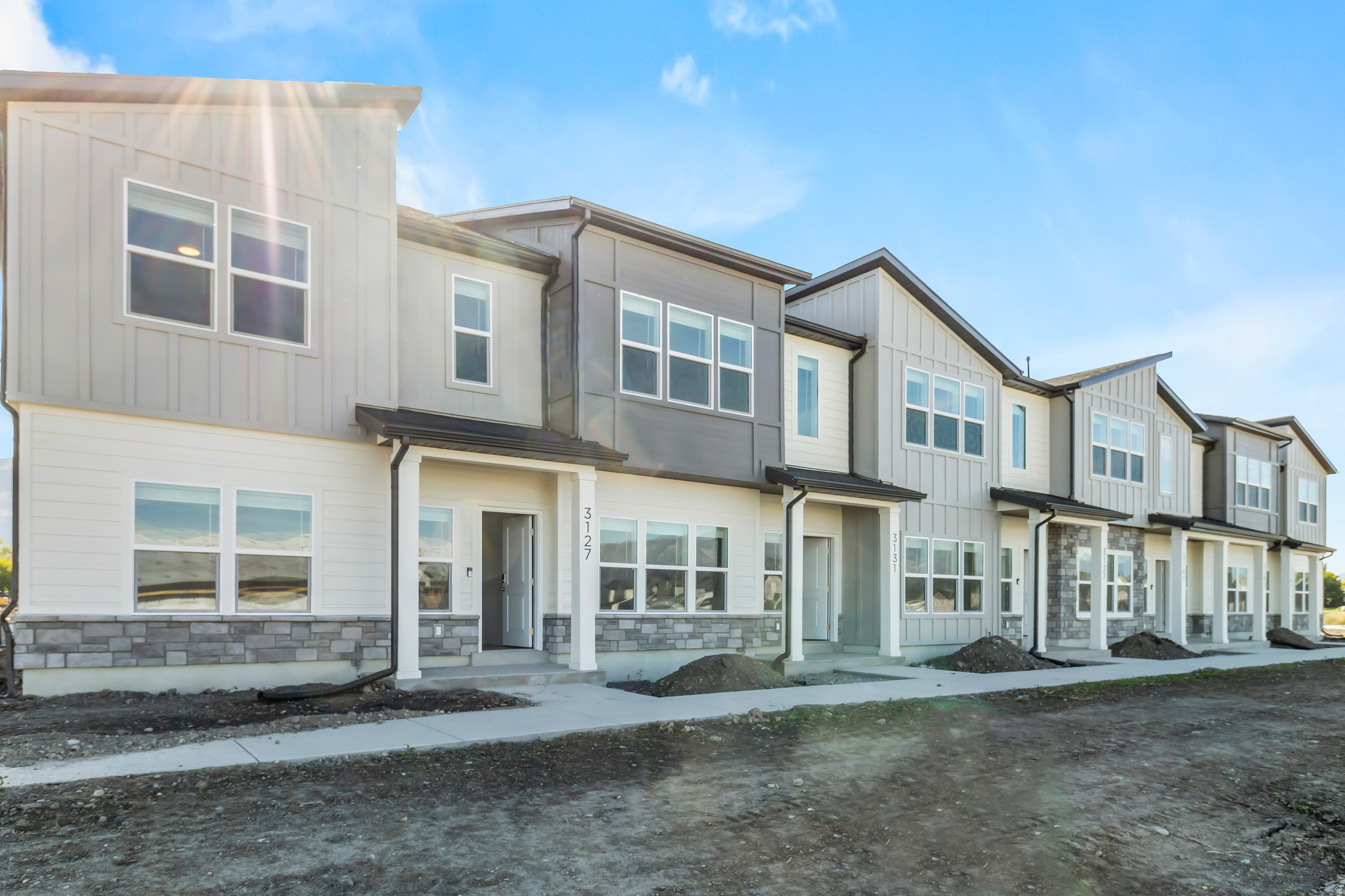 Here is the Sitka townhome in the heart of Nibley in Visionary's Ridgeline Park community! This 2-story floor plan features 3 beds and 2.5 baths, with all the bedrooms on the second floor as well as two bathrooms. Intentional, well-thought-out space on the main floor for open concept living with an additional half bath on the main floor and a two-car garage. The Ridgeline Park community is focused on "Community" living with amenities such as walking trails, a clubhouse, pool, pickleball courts, and a future city park that is underway (concept attached!) The home is remarkably easy to see. Be done with maintenance and fixer-uppers, and come and get a brand new home with a warranty today! *Photos of the home are not of the exact unit*