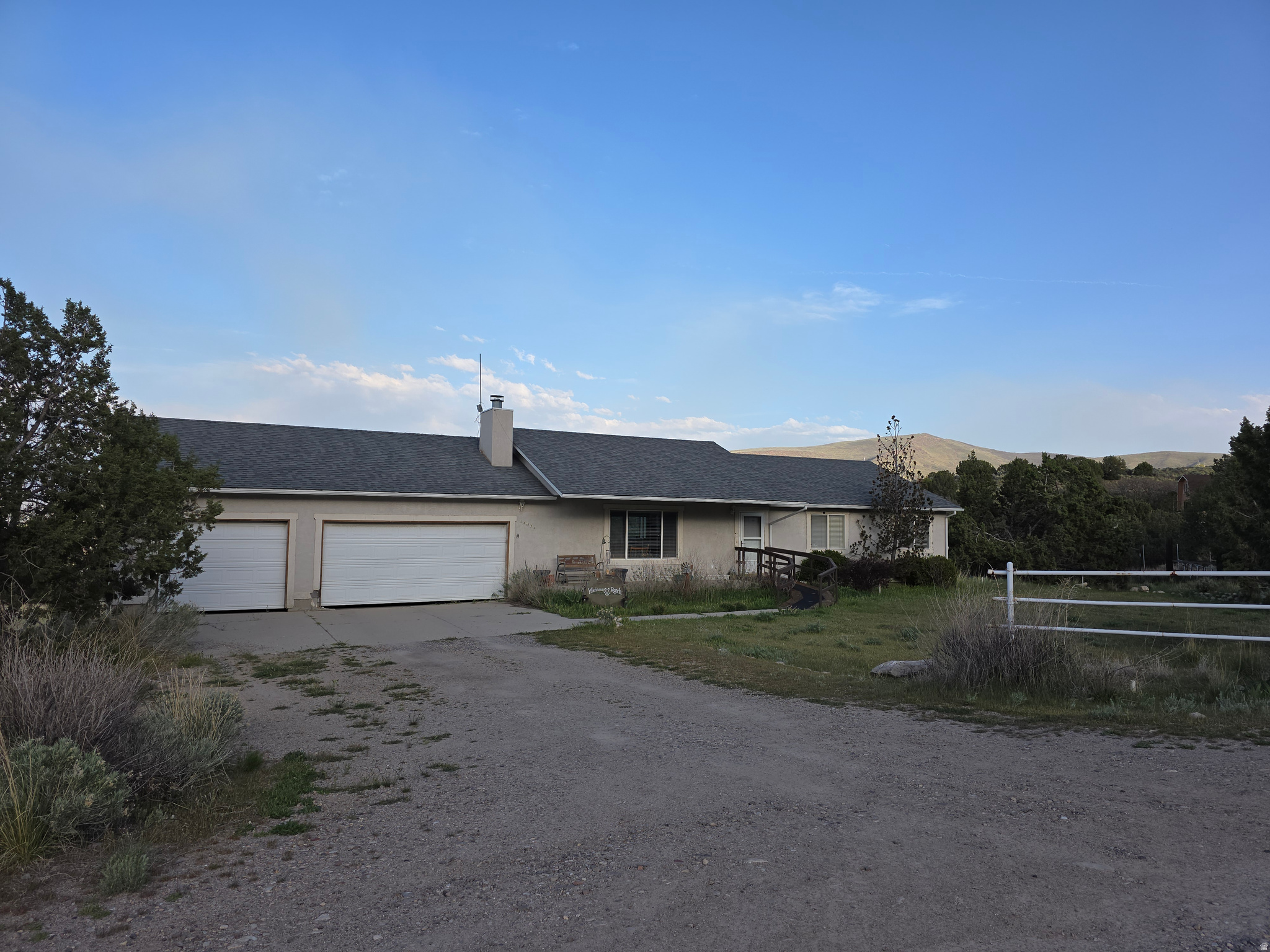 PRICE REDUCED! Rare Find!  This Herriman home has 5.66 acres of usable land. Exquistie Mountain and Valley views!  It features a 2800 sq. ft ramble with vaulted ceilings, 3 car garage, an unfinished walkout basement.   roof replaced in 2019.  It is accessed through Hi County Estates but is not part of Hi Country.  The property is being sold AS-IS.  Buyer to verify all.