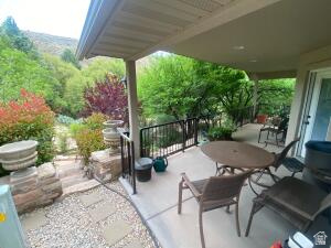 A very quiet & peaceful way to live your life.  Harrisburg, just minutes from St George, without the city noise & the traffic. The backyard feels like a private oasis.  Tree-filled open space, shaded, private & cool. One bed rm and a large bonus rm w/ murphy bed, desk, and treadmill.  Stick-built with 2X6 exterior, skylights & many other quality upgrades. Short walk to pool and clubhouse on the tree-lined streets. Oversized 2-car carport with beautiful outdoor lighting.