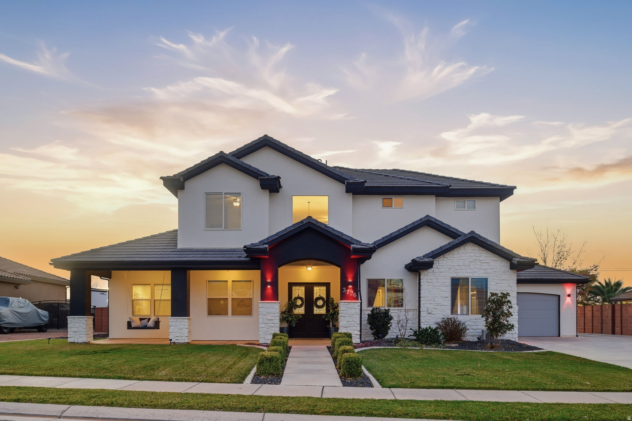 Welcome to this show-stopping 4000 sqft luxury retreat in Little Valley! This beautifully renovated home has it all, perfect for families. Offering multiple areas for hosting and entertaining, from the dramatic spa-inspired backyard, to the expansive climate-controlled double 40 X 40 RV garage with 16 ft doors, or the fully sound-insulated theater/bonus room. Imagine backyard barbecues by the pool or romantic nights in the hot tub cabana. This home has it all.  Over $500,000 in thoughtful and tasteful renovations completed in 2024. A giant slider opens to the backyard oasis. New flooring, countertops, pool, landscape, concrete, additional sqft and fresh paint inside and out.  The first floor offers vaulted ceilings, an office, guest en-suite, and a Primary bedroom with spa-inspired luxury shower, freestanding tub and huge closet. The heart of the home features an open, airy floor plan with soaring 20' ceilings and excellent natural light. The kitchen features an oversized waterfall-edge island and walk in pantry.  The 1,600-sqft detatched double RV garage features 18' ceilings, 16' doors, full insulation and RV Hookups. Roughed in for a future full bath and/ or kitchen. The courtyard features privacy, safety and room for kids, parking or pets. Behind the shop is enough space for a future pickleball or volleyball court.  Set on a half-acre lot in Little Valley with no HOA. This 4,000-sqft luxury home plus shop offers privacy, scale, and resort-style living. 5-bed, 3.5-bath Located just blocks from pickleball courts at Little Valley Park, BLM trails, shopping, and all that St George has to offer.