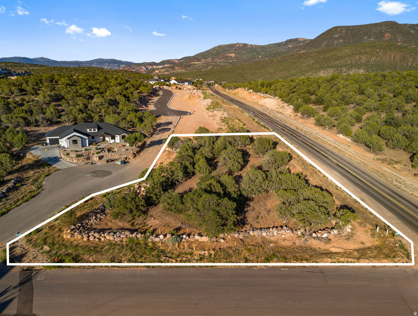 his is Lot Number 2, a .77-acre homesite located in the highly sought-after Estates at South Mountain subdivision. Enjoy stunning views of Shurtz Canyon and the surrounding Southern Utah mountains. This growing community is positioned near planned future elementary, middle, and high schools, adding long-term value and convenience. Bring your own builder or choose to build with the South Mountain Development team. Don't miss this opportunity to secure a premium lot in one of Cedar City's most desirable neighborhoods.