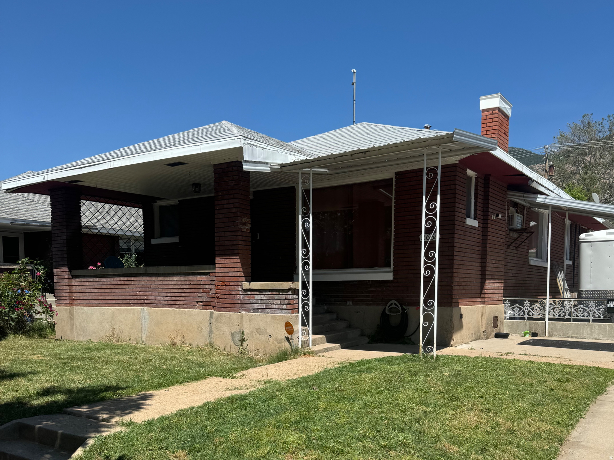 Charming Ogden home with income potential! Features 3 bedrooms and 1 bathroom on the main level, plus a separate 1-bedroom, 1-bathroom basement apartment with an updated kitchen. The upstairs is currently rented for $1,400/month, offering a potential opportunity to help offset your mortgage. Includes a 2-car garage and plenty of character throughout. Great option for investors, owner-occupants, or multi-generational living.