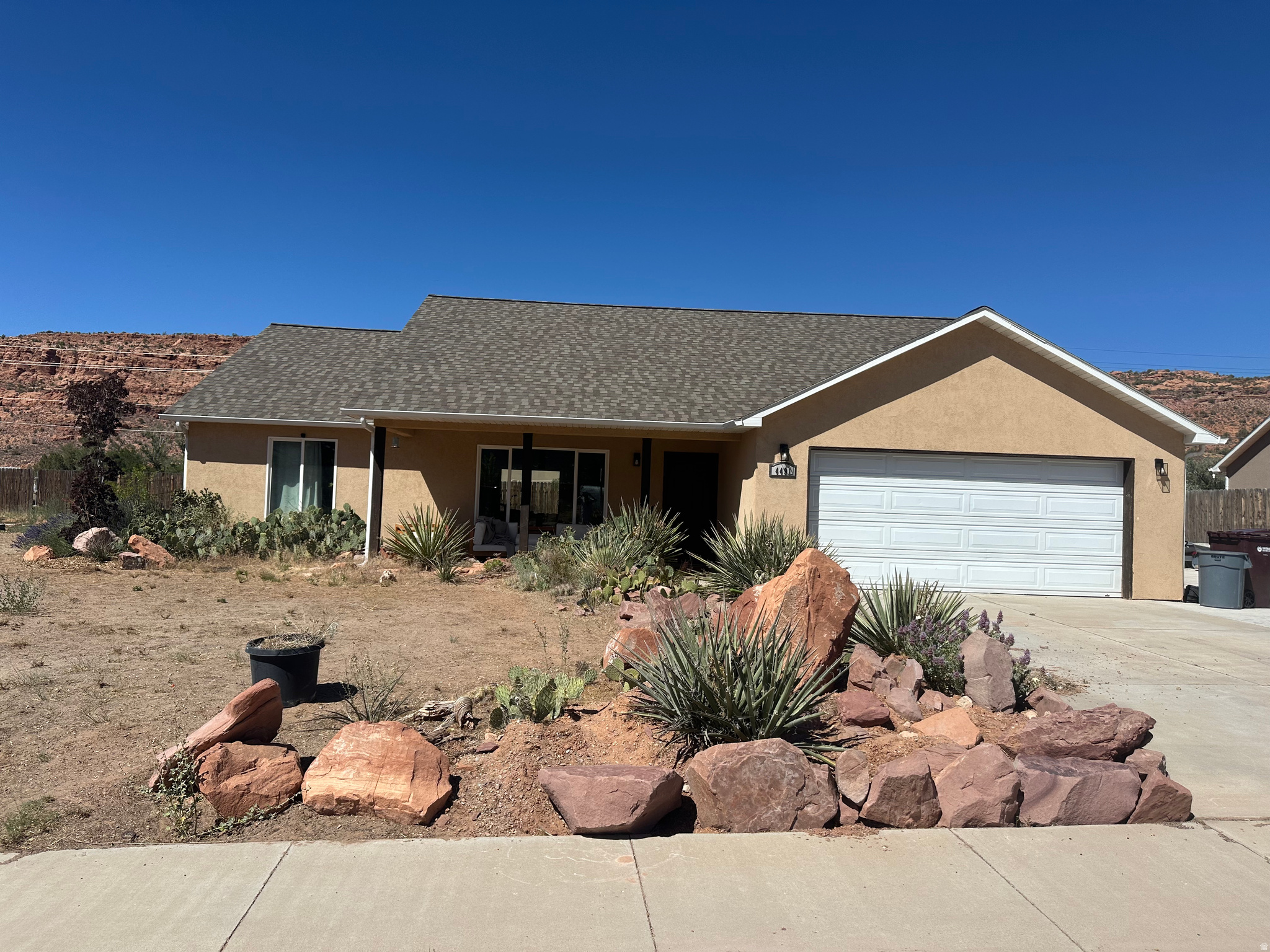 Located in the desirable Pueblo Verde neighborhood of Spanish Valley, 4491 S Vista Verde Circle offers 3 bedrooms, 2 bathrooms, and 1,518 square feet of comfortable living space on a spacious 0.34-acre lot. This well-maintained home features a functional floor plan, beautiful upgraded appliances and kitchen island, two car attached garage, and raised garden beds that add versatility to the outdoor space. With great views, generous outdoor living potential, and a sought-after location, this property presents an excellent opportunity to enjoy all that Moab has to offer. Schedule a showing today to experience this inviting home for yourself.  Square footage figures are provided as a courtesy estimate only and were obtained from county tax records.  Buyer is advised to obtain an independent measurement.