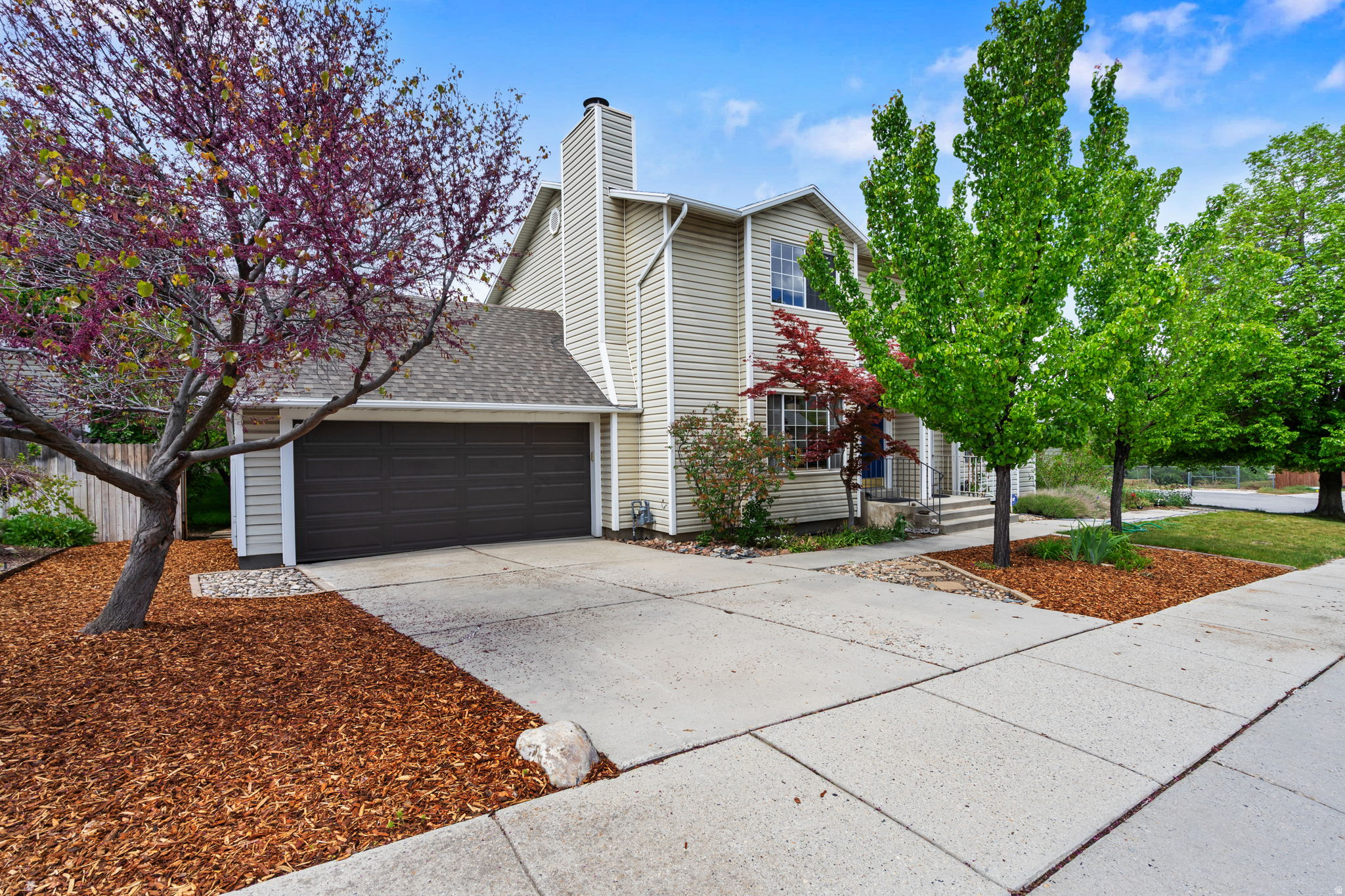 Location, location, location! Nestled in the heart of Cottonwood Heights on a quiet cul-de-sac, this 3-bedroom, 3.5-bath twin home with NO HOA is just minutes from Big Cottonwood Canyon and Little Cottonwood Canyon, offering quick access to some of Utah's best skiing, hiking, and outdoor recreation. Each bedroom features its own private bathroom, providing comfort and flexibility for guests or roommates. Major updates include central air installed in 2025, a roof approximately 9 years old, and a water heater replaced in 2020. Enjoy a private, beautifully landscaped backyard and the feel of a single-family home without the price tag. Ask about 1% temporary rate buy down offered through preferred lender. Square footage figures are provided as a courtesy estimate only.  Buyer and buyers agent is advised to obtain an independent measurement and verify all listing information.