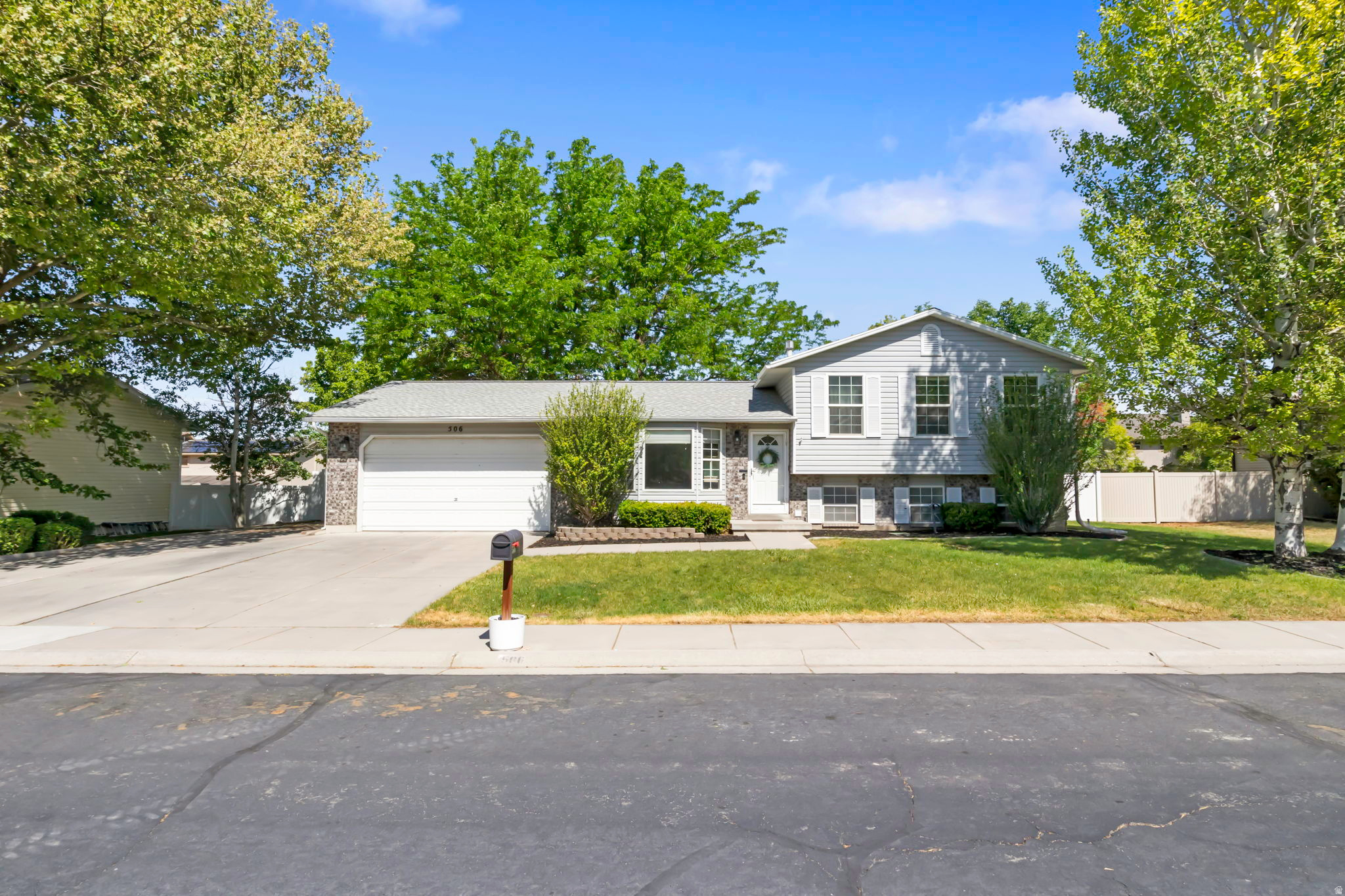 **SELLERS OFFERING $5,000 IN CONCESSIONS!**Perfect Location meets Ultimate Backyard Living! Nestled in the heart of Stansbury Park-just minutes from the golf course and the lake-this beautiful 4-bedroom, 2-bathroom home is a rare find. Inside, you'll love the updated kitchen and the flexibility of two separate, spacious family rooms. Step outside to your private backyard oasis, featuring a massive deck perfect for summer BBQs, a sprawling lawn, and a handy storage shed. Got toys? The property boasts dedicated RV parking leading to a large, paved parking pad in the back. Bonus: a massive crawl space handles all your extra storage needs with ease. Clean, bright, and perfectly situated-schedule your tour today!