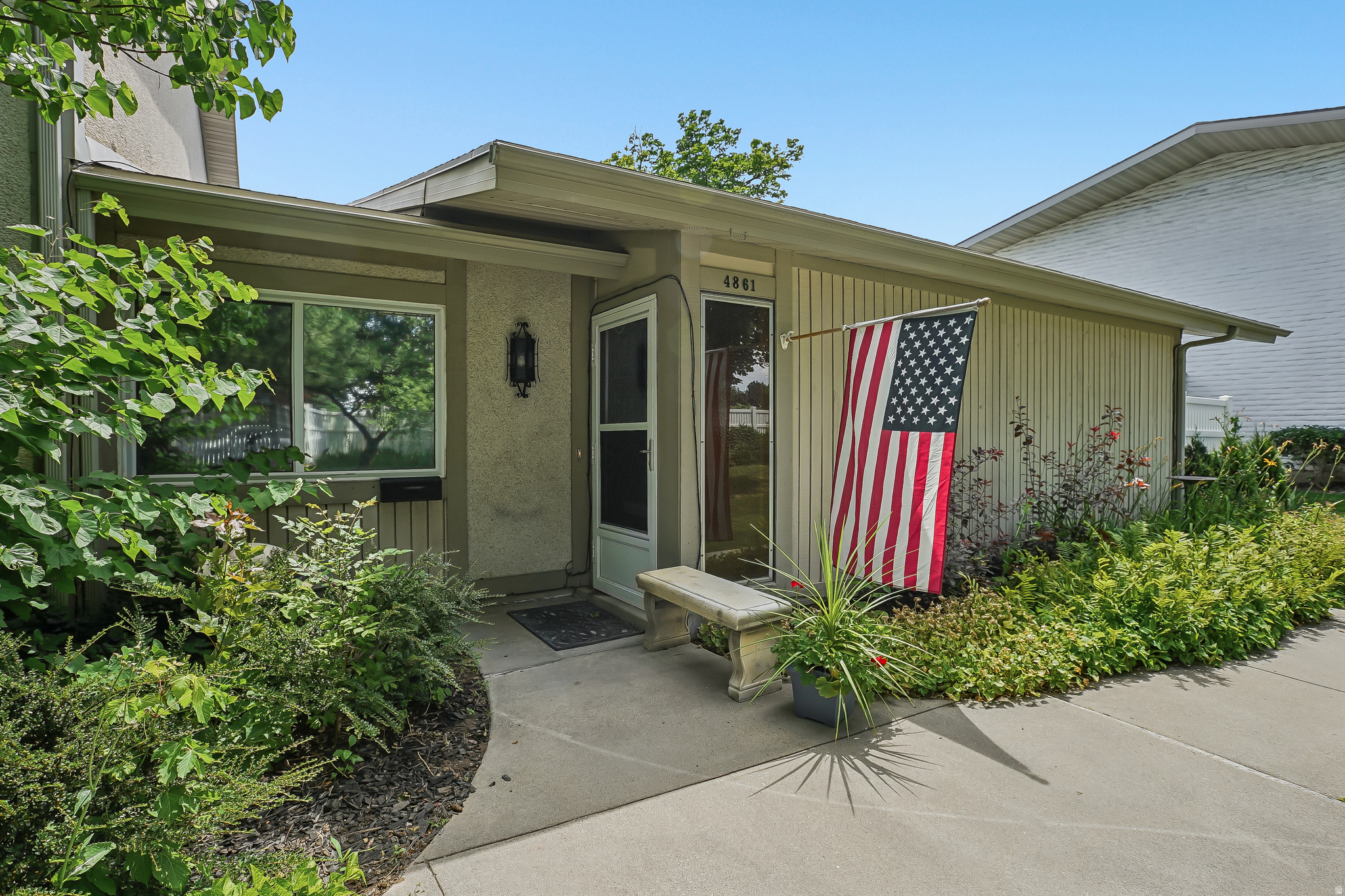 You have found it! This sensibly updated mid-century modern single-level home is located in the highly desired Holladay area. Enjoy effortless one-level living featuring a bright layout, two bedrooms, and two full bathrooms. A standout feature is the amazing private patio running the entire length of the home, accessed by updated, oversized sliding glass doors for seamless indoor-outdoor living. The well-appointed kitchen includes Silestone countertops and a built-in pantry. Complete with optimal storage, in-unit laundry, and two covered parking spots this low-maintenance home offers it all in a quiet community setting.