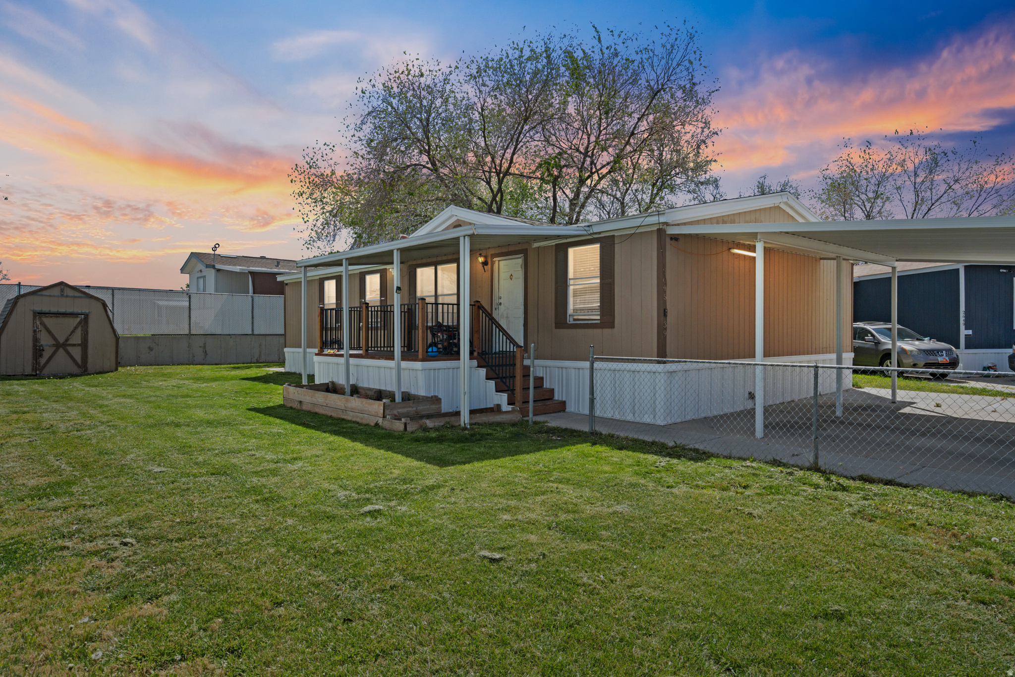 Charming Mobile Home in West Valley City! Welcome to this well-maintained home featuring 3 spacious bedrooms and 2 full bathrooms, offering a comfortable and functional layout. Enjoy the convenience of a covered carport with space for up to 3 vehicles, providing ample parking for family and guests. This home is perfect for anyone looking for affordable living with plenty of room to enjoy. Conveniently located near shopping, schools, parks, and easy freeway access. Don't miss this great opportunity!