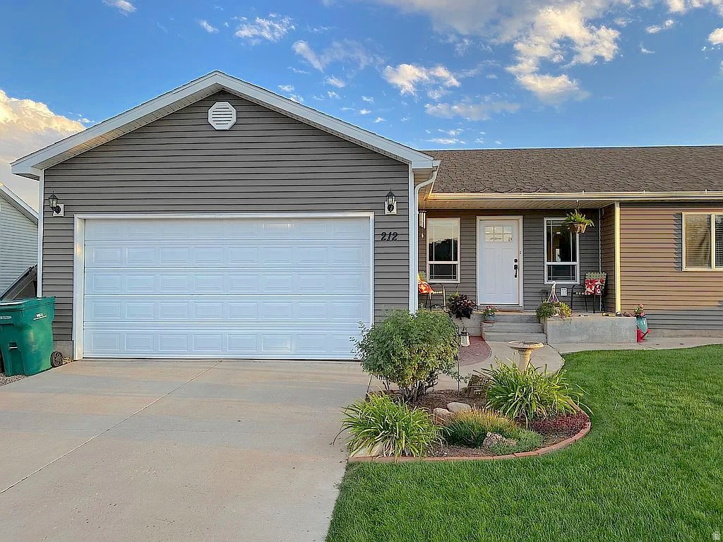 Beautiful nearly new home with a standout yard rarely found in Blanding - fully landscaped with sprinkler system, fencing, a huge stamped concrete patio, and plenty of space to enjoy the outdoors. Inside features spacious rooms and an open, flowing layout. Originally designed as a 5-bedroom home, it was reconfigured into a roomy 3-bedroom floor plan with larger living spaces, but could easily be converted back to 4 or 5 bedrooms if desired. The large master suite offers dual closets and extra space for a desk, workout area, or sitting room. Stylish designer finishes, luxury plank flooring, and major updates including new roof and siding in 2021 make this home truly move-in ready. Very well maintained and shows beautifully.