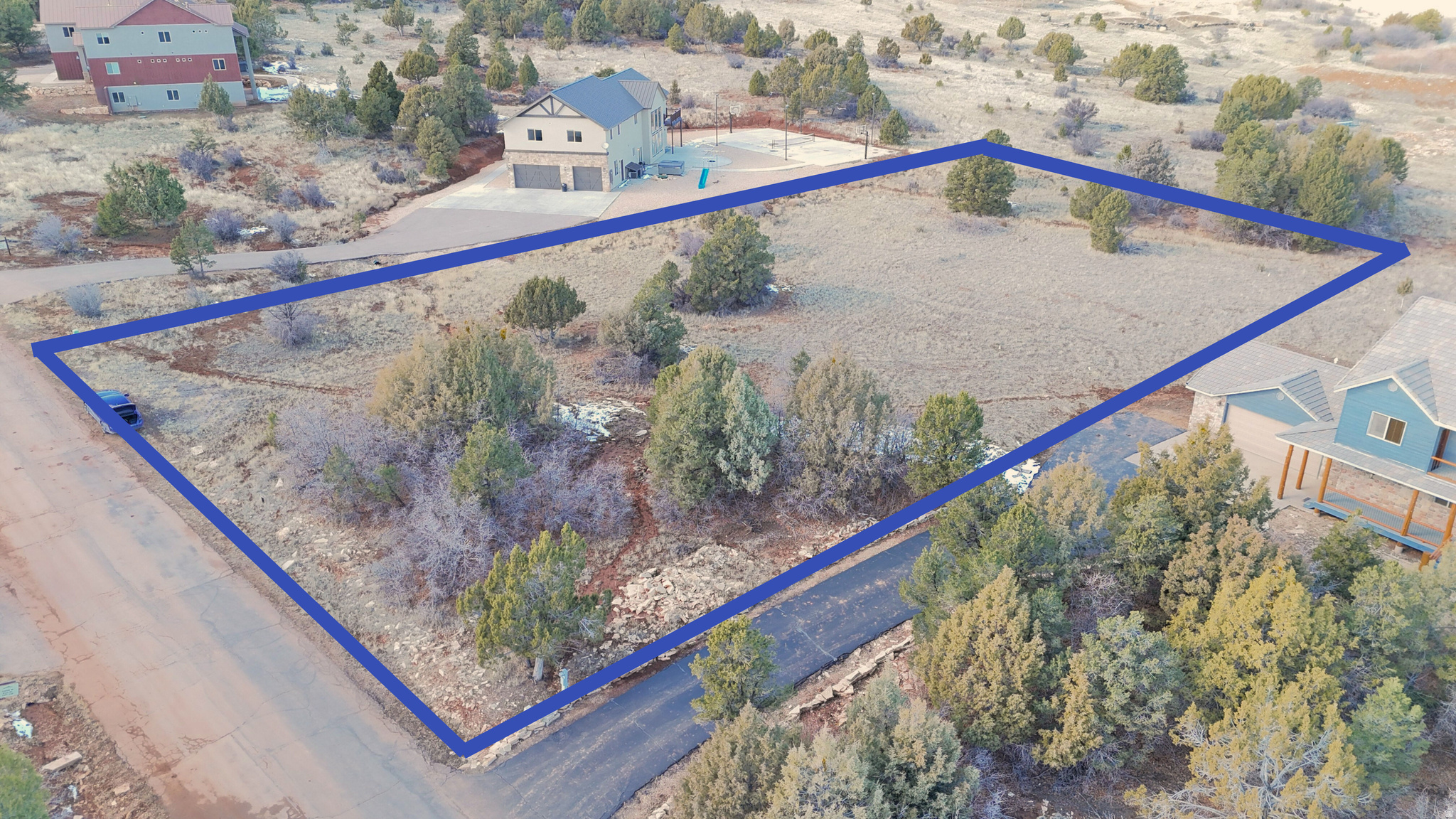 Short-term rentals allowed, loads of amenities, and 10 minutes away from one of the most incredible landscapes in the world! This property sits between the East Zions entrance and the new $50 million dollar Zions discovery center that's expected to be finished late 2026.  Your purchase will include home plans to use at your discretion. Property boundary lines depicted in photos are approximate and not based on a licensed survey. For exact property boundaries, please consult a certified surveyor.