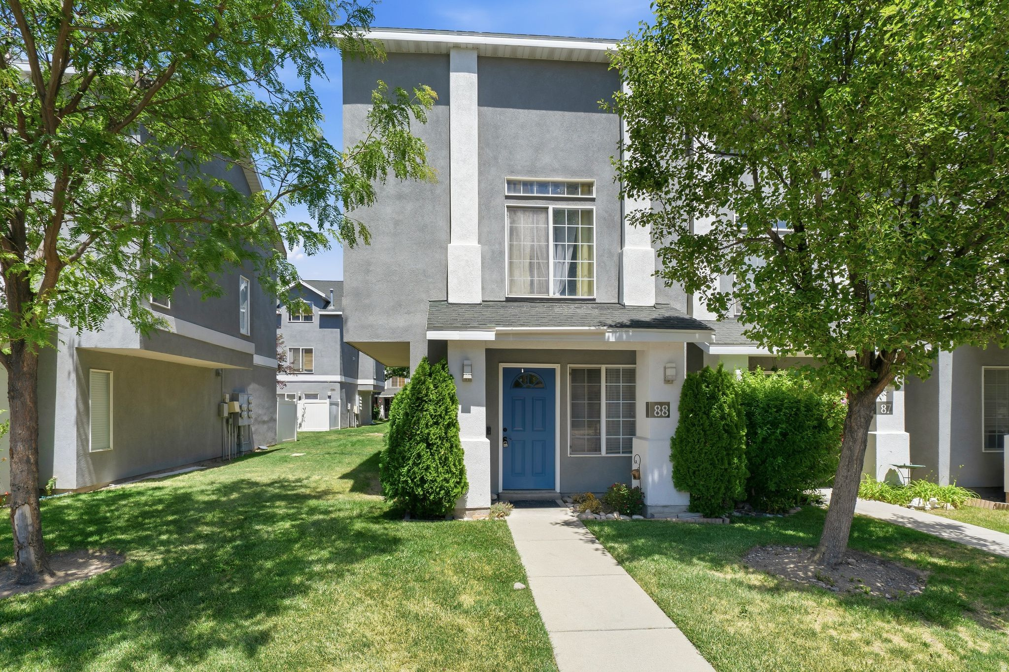 This well-maintained end-unit, three-story townhome offers a peaceful village-style community with a pool and clubhouse. Ideally located just minutes from both downtown Salt Lake City and Salt Lake City International Airport. Enjoy quick access to major highways (I 15, I 80, I 215), and family-friendly activities such as Clark Planetarium, Discovery Gateway, and City Creek Center all just 10 minutes away. Walkable streets, transit options, and a private fenced backyard patio make this home perfect for modern city living. Seller offering to cover 12 months of HOA fees at current cost."