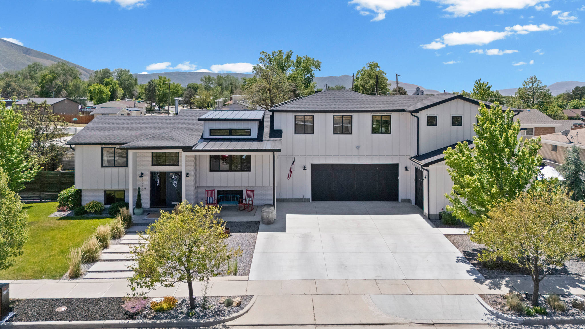 Tucked into one of the area's most desirable neighborhoods, this beautifully maintained home combines comfort, functionality, and modern style in all the right ways. This home has been completely renovated from top to bottom. It features a new roof, siding, windows, updated kitchen and bathrooms, furnace, ac units, water softener, water heaters, flooring, lighting, 31 solar panels, an 1100 sq ft garage, plumbed for a heated driveway, and swim spa. The home is also within short walking distance to a community pool.  If you are looking for a meticulously updated home in a great area this is the home for you!