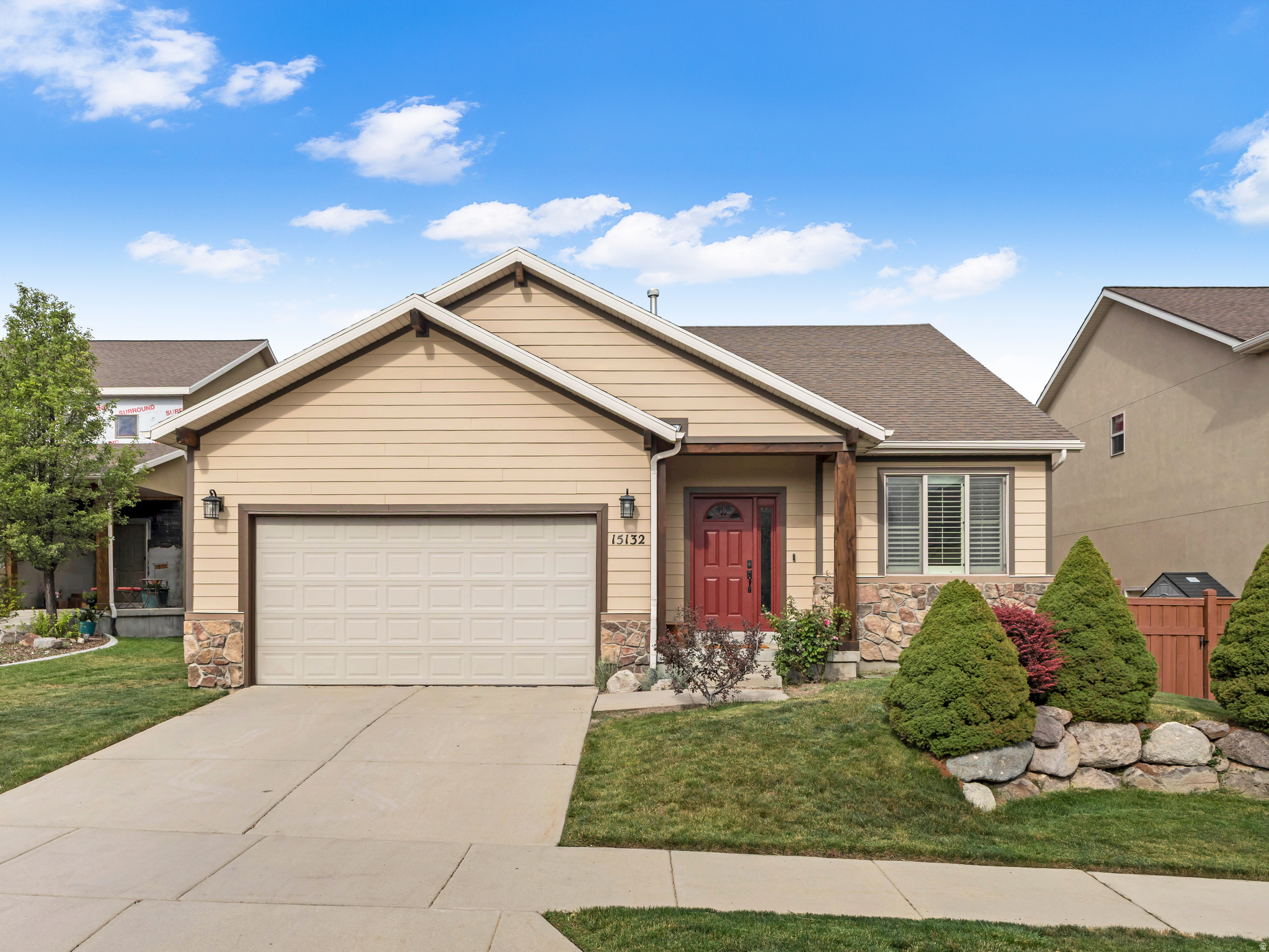 *Open House Sat. July 25 11AM-1PM* Every neighborhood has that house. Flag on the porch, driveway swept clean, somebody flipping burgers before the sun's even down. This SunCrest rambler has had exactly one family in it since the day the last nail went in.  Main-level living keeps the kitchen, primary suite, and laundry on one floor, so the everyday stuff never touches a staircase. The kitchen opens straight into the family room, no wall between whoever's cooking and whoever's already claimed the couch, which means nobody misses a play, a punchline, or dinner hitting the table. Six bedrooms and three bathrooms give you room to spread out, some up top, the rest downstairs in a basement that's already finished and built for exactly this: a ping-pong table just because, billiards for the serious games, movie night on the big screen. It's the kind of space that turns a house into the version of the American dream you actually want to live in.  Outside is where this place shows its personality. A flat, usable backyard on a corner lot at the end of a quiet cul-de-sac means room for pizza night on the patio, extra cheese and pepperoni, no Hawaiian allowed, and neighbors who wander over anyway.  Up here, SunCrest sits above the inversion, where the air stays cleaner and the evenings hold onto a few extra degrees of cool. Trails wind through the community, and the HOA keeps up a clubhouse, a pool, and a gym just up the road. This house was never chasing a view. It was built around a life, and there's a difference.  One family made it feel lived in, in the best possible way. Now it's somebody else's turn to fly the flag, fire up the grill, order the pizza, and let a Draper summer do what it does best.