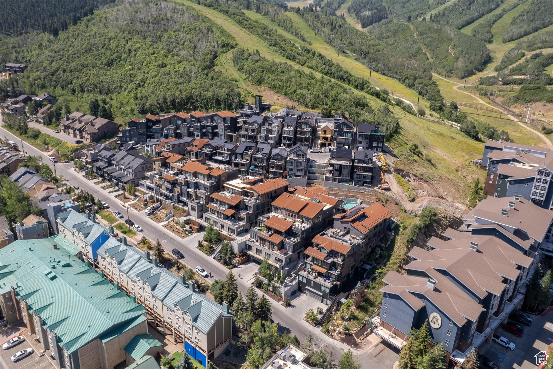 Welcome to the Kings Crown community, where luxury meets convenience in perfect harmony. Nestled in the vibrant core of Park City and just moments from the lively Main Street, this exceptional residence offers unrivaled ski-in/ski-out access to the renowned Park City Mountain Resort. Property Highlights:  Prime Location: Enjoy the ultimate in mountain living with direct access to world-class skiing and the vibrant amenities of Main Street.  Organic-Modern Design: This home boasts a sleek, open floorplan designed to blend seamlessly with its natural surroundings. The single-level layout promotes effortless flow between spaces, creating a welcoming and airy atmosphere.  Gourmet Kitchen: The open kitchen features custom cabinetry and top-of-the-line Thermador appliances, perfect for culinary enthusiasts.  Luxurious Primary Suite: Retreat to the spacious primary suite with high ceilings, a custom closet, and a spa-like bathroom equipped with heated flooring, recessed under-cabinet lighting, a soaking tub, and a steam shower.  Versatile Secondary Bedroom: This room doubles as a bonus space with its own TV and seating area, along with an ensuite bathroom.  Exclusive Amenities: The building enhances your lifestyle with a well-equipped gym, a sparkling swimming pool, and an outdoor grill area. The rooftop deck, complete with a firepit and hot tub, offers breathtaking views and an ideal spot for aprs-ski gatherings.  Social Spaces: Connect with fellow residents in the thoughtfully designed lounge area, perfect for unwinding after a day on the slopes. This condo is more than a residence-it's a lifestyle offering unparalleled access to Park City's best and a luxurious sanctuary to retreat to after each adventure. Don't miss the chance to make this mountain paradise your own.