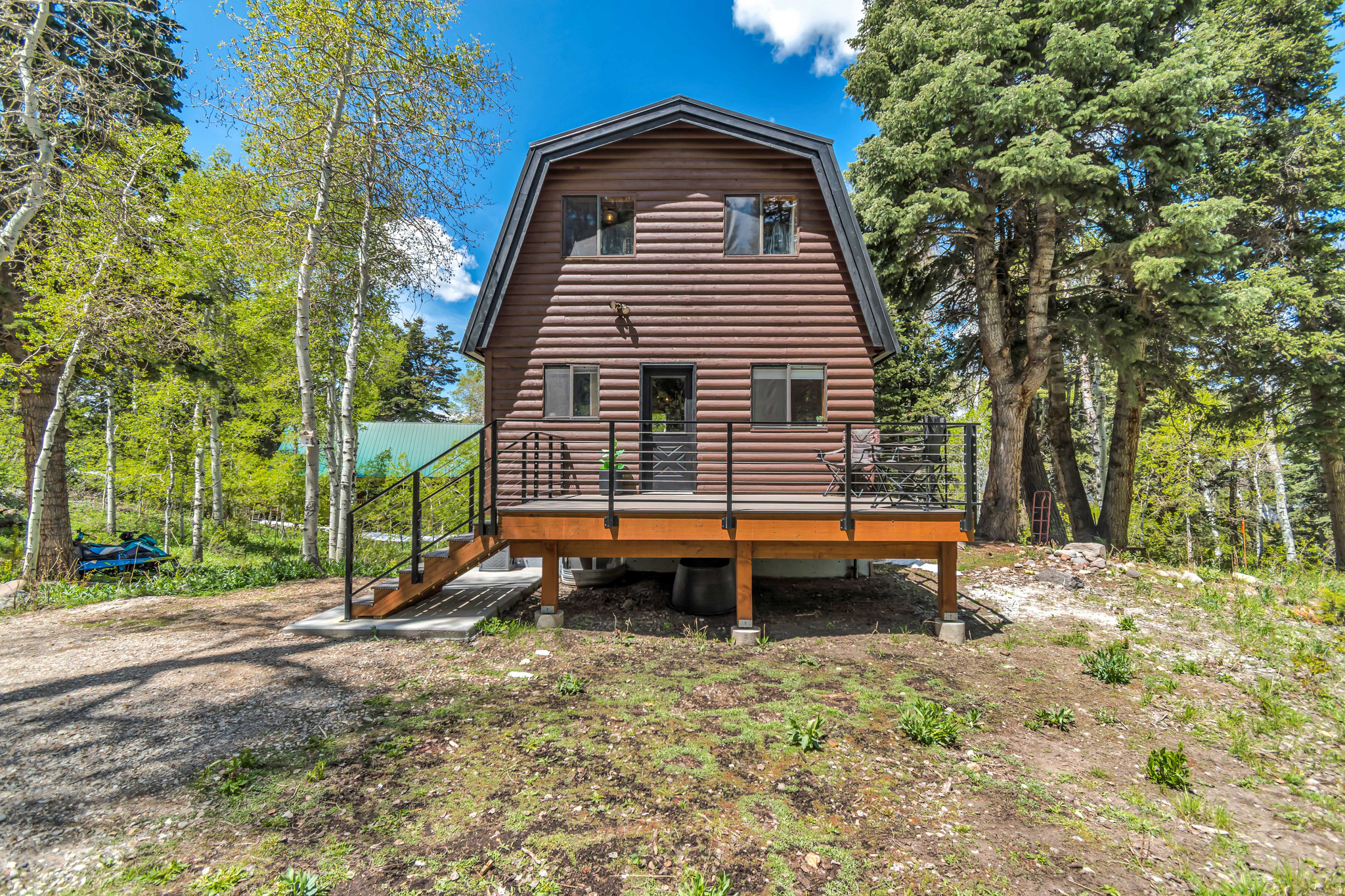 Updated, knotty pine cabin on the upper mountain in theTimber Lakes private community .Surrounded by mature aspen trees and evergreens, and frequent moose, deer, and much more wildlife. Ride snowmobiles, ATV, or hike out directly from your new home into the Uinta National Forest. Enjoy fast and reliable FIBER INTERNET ready to use immediately. Take advantage of this peaceful escape, with being only minutes from world class Skiing and golf in Heber/Park City.  Roof about 2 years old. Water heater 2 years old. Furnace 1 year old.  It does have year round access