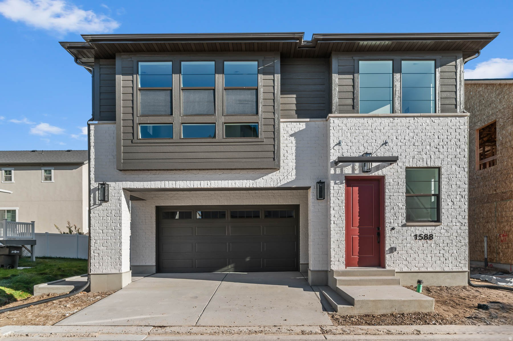 Come see this beautiful brand new Sundance Ballpark cottage home in a great Provo community with great lake views!  This home features an array of amenities including can lighting, craftsman base & casing and energy efficient amenities with a tankless water heater for low cost living! The modern kitchen highlights white laminate cabinets, quartz counters and stainless steel gas appliances for all your culinary needs. Durable flooring includes laminate hardwood flooring, carpet and vinyl tile throughout. The owner's bathroom includes quartz shower surrounds and black matte hardware for a refined touch.  Comes fully landscaped with localscaping features for an easy care, turn key experience!