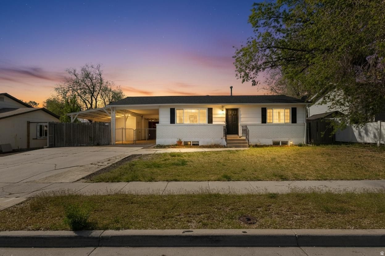 PRICE REDUCED - This one just got more interesting. Completely remodeled in 2022, this rambler has real flexibility built in - two kitchens, two living rooms, separate entrance. Live in one side, rent the other. Multi-gen setup. House hack it. The options are there. Inside: updated fixtures, new tile, fresh carpet, updated bathrooms, spacious bedrooms. It feels current because it is. Big-ticket items are already done - new furnace and A/C (2023), new roof (October 2025). The stuff that kills deals after closing? Already handled. Outside you've got a massive carport with shop, RV pad, and covered parking for a large boat or RV. The open field behind the home adds privacy that's hard to find. Two things to know upfront: the deck needs replacing and the back fence needs work. It's priced accordingly - and for the right buyer, that's just negotiating room and a chance to finish it your way. Price came down. Time to take a serious look.