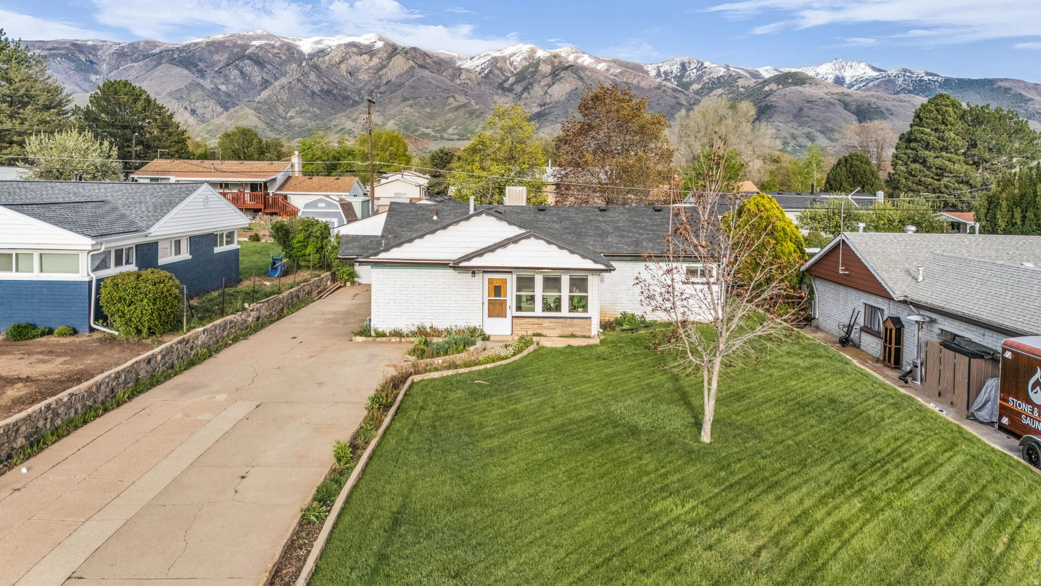 Are you looking for easy, single-level living with a little extra charm? This is it! This adorable 4-bedroom, 1.5-bath gem in the heart of Layton is ready to welcome its new owners. Step outside to your own private backyard retreat-perfect for summer BBQs, relaxing evenings, or letting pets and kids run free-complete with extra storage sheds for all your toys and tools. The oversized detached 2-car garage is a dream, offering plenty of space for parking, projects, or that workshop you've always wanted. And the location? Hard to beat! You're just minutes from great restaurants, fun shopping, and quick commuter access, making daily life feel effortless. Packed with personality, convenience, and opportunity-this one truly checks all the boxes!