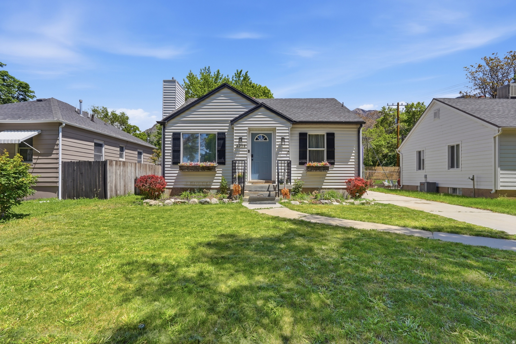 Located on the popular East Bench, this classic rambler combines vintage charm with modern updates. The home offers 4 bedrooms,  1.75 baths, and plenty of natural light. The living room has a gas fireplace, modern light fixtures, and connects directly to the kitchen, making it great for entertaining. The updated kitchen features newer stainless-steel appliances, all included in the sale. Upstairs, two mini-splits help keep the temperature comfortable and have an air filtration system for better efficiency. Downstairs, you'll find a cozy family room, two bedrooms, a bathroom with a walk-in shower, and a laundry room. Take in beautiful mountain views from the backyard, which is fully fenced and ready for your personal touch. The oversized workshop or garage is a rare feature, ideal for hobbies, projects, or extra storage. Don't miss your chance to see this special home in one of Ogden's favorite neighborhoods-schedule a showing today!