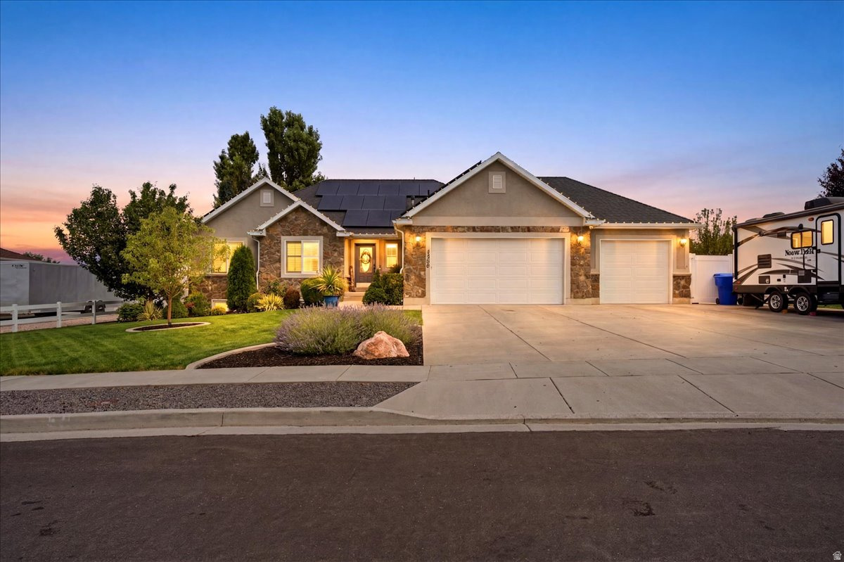 WELCOME TO THIS GOREOUS, SOUTH FACING "SHOW" HOME THAT PERFECTLY BLENDS STYLE, COMFORT AND FUNCTIONALITY.  FROM THE MOMENT YOU STEP INSIDE, YOU'LL APPRECIATE THE STYLE OF "PLANTATION SHUTTERS" MIXED WITH STUNNING LIGHT FIXTURES AND BREATHTAKING MOUNTAIN VIEWS. THE THOUGHTFULLY UPDATED KITCHEN OFFERS A MODERN FEEL FLOWING SEAMLESSLY INTO THE INVITING LIVING AREA WITH A BEAUTIFUL CORNER STONED GAS FIREPLACE. THE PRIMARY SUITE IS A TRUE RETREAT COMPLETE WITH DOUBLE SINKS, A LARGE SHOWER AND RELAXING GARDEN TUB. YOU'LL NOTICE A LARGE WEIGHT ROOM & AN ABUNDANCE OF STORAGE CABINETS TO FIT YOUR NEEDS.  DELIGHTFUL LANDSCAPING WITH A DECK & PERGOLA STYLE COVERED PATIO.  THE COMFORT, ELEGANCE AND PRIDE OF OWNERSHIP THROUGHOUT WILL MAKE THIS HOME DELIGHTFULLY YOURS TO KEEP! (5th Bedroom has no Closet)
