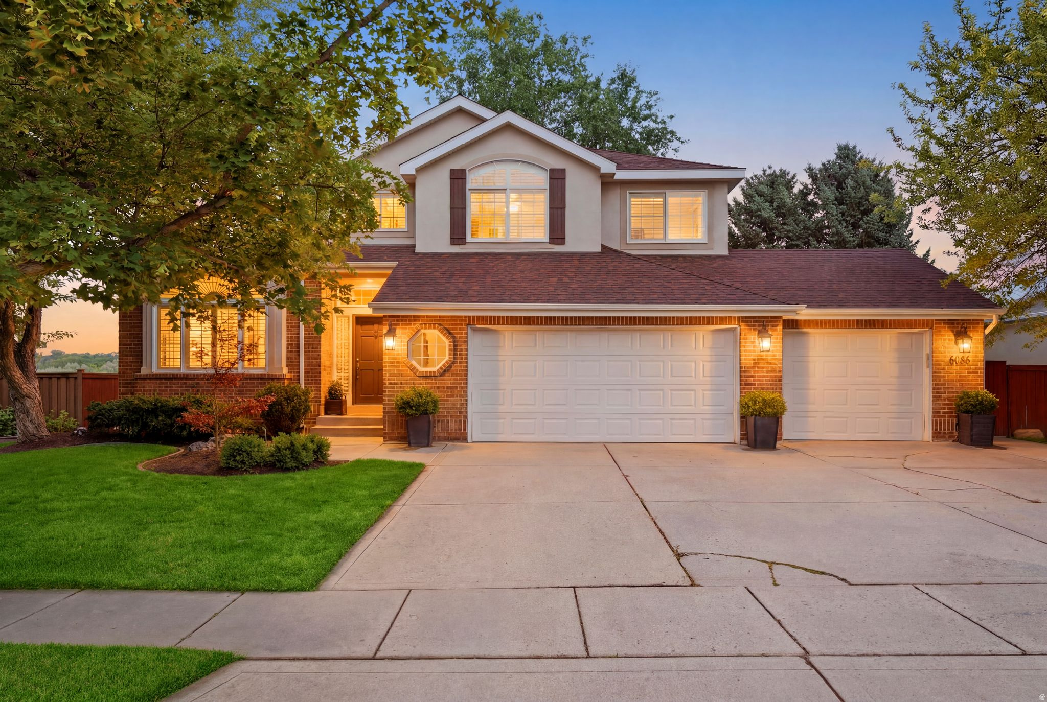 Nestled on a quiet, tree-lined street in the heart of Millcreek, this beautifully remodeled home offers luxury, comfort, and breathtaking mountain views from nearly every window. The expansive Trex deck overlooks open green space, and with direct access to playgrounds, sports fields, and the Creekside walking trail, your backyard becomes an extension of the natural surrounding beauty. The brand-new hot tub and custom-built treehouse add a touch of magic for kids and adults alike. Inside, you'll find gorgeous hardwood floors, vaulted ceilings, expansive living spaces, and a gourmet chef's kitchen featuring premium Viking and Bosch appliances-the perfect space to gather and entertain. The spacious primary suite is a true retreat, complete with a spa-inspired bathroom, generous walk-in closet, and stunning views to greet you each morning. Ideally located just minutes from parks, the rec center, shopping, dining, and highly sought-after schools, this is more than just a home-it's a lifestyle. Beautifully designed for everyday living and creating unforgettable moments, this is a place where new memories are waiting to be made.