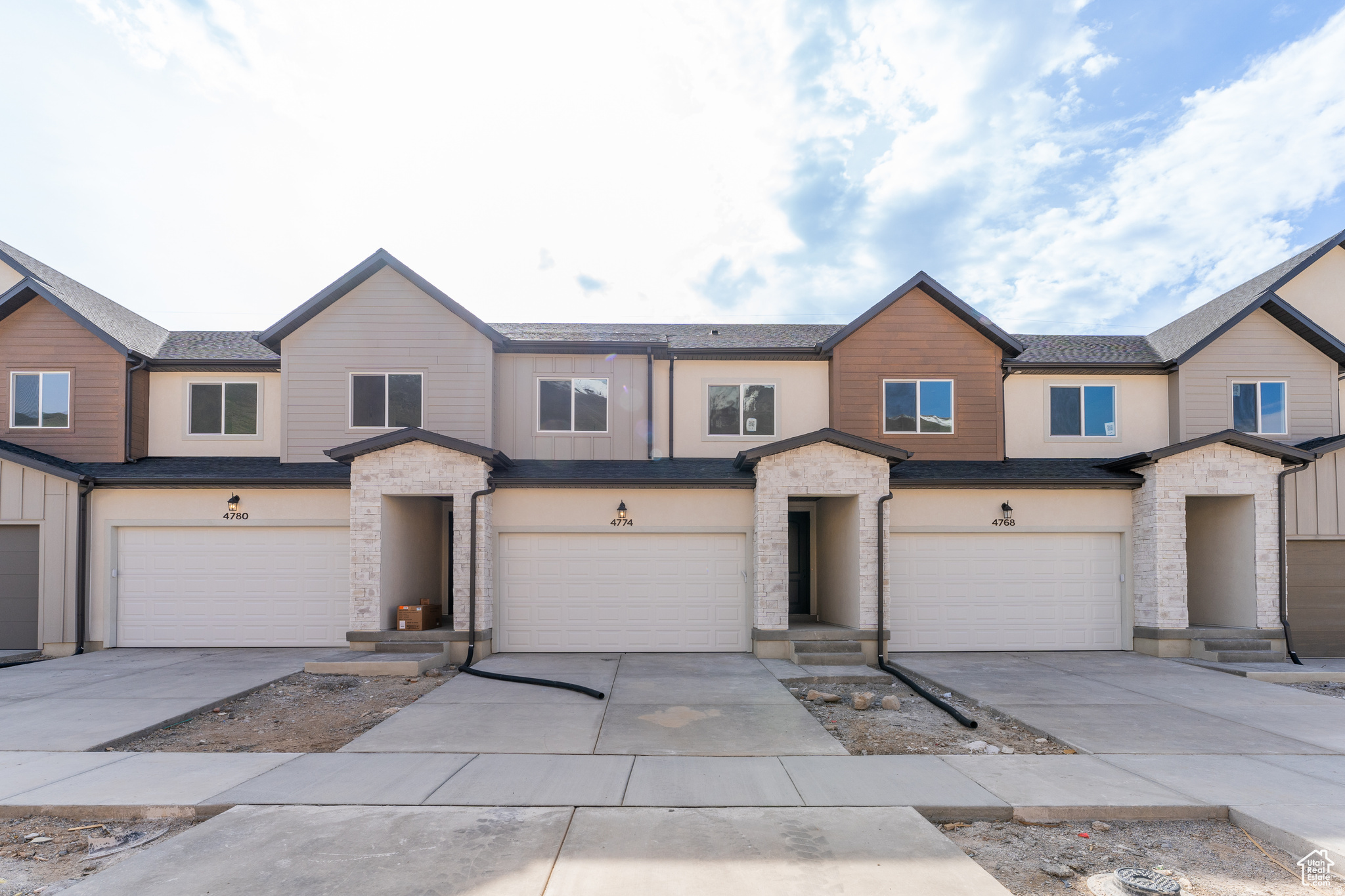 Experience the ideal mix of comfort and convenience in this beautifully located townhome. Nestled near Spanish Fork Canyon in the sought-after Harmony Ridge community, you'll enjoy breathtaking mountain views and exceptional amenities, including a clubhouse, fitness center, swimming pool, and pickleball courts. This home features a fully finished basement that adds incredible living space, complete with an additional bedroom, full bathroom, a second living room, and abundant storage. Just minutes from The Oaks at Spanish Fork, you'll have easy access to one of the area's premier golf destinations. Step right out your back door to a scenic walking and biking trail that stretches for 8 miles, offering stunning mountain views and the perfect setting for outdoor living.
