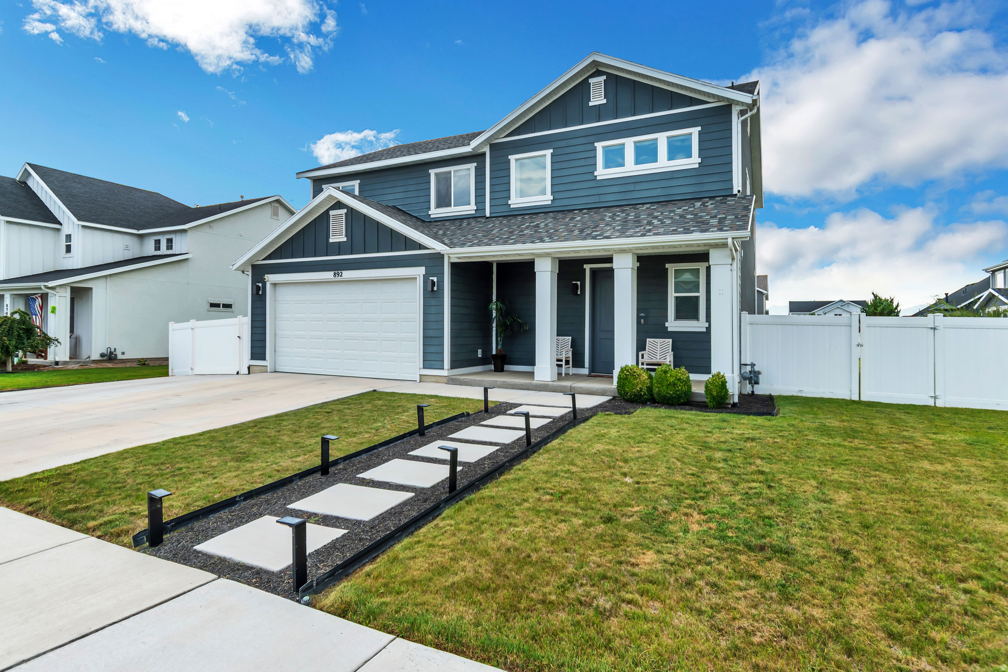 Step into your dream home! This stunning residence boasts over $50,000 in upgrades and sits on a sprawling nearly quarter-acre lot with meticulously finished landscaping, making it absolutely move-in ready. As you enter, you'll be greeted by soaring 9-foot ceilings on the main level and an abundance of natural light that fills every corner of this inviting three-bedroom home. The massive loft offers flexible space, and you'll easily envision converting it into a fourth bedroom should your needs ever grow. Car enthusiasts and eco-conscious buyers will delight in the two-car garage, thoughtfully equipped with an electric car charger. Plus, there's additional RV parking on the side, complete with a huge concrete pad, perfect for all your toys and vehicles! Nestled in an incredible area, this home is more than just a house; it's a lifestyle waiting to be embraced. Don't miss this unparalleled opportunity to make this magnificent property your very own!