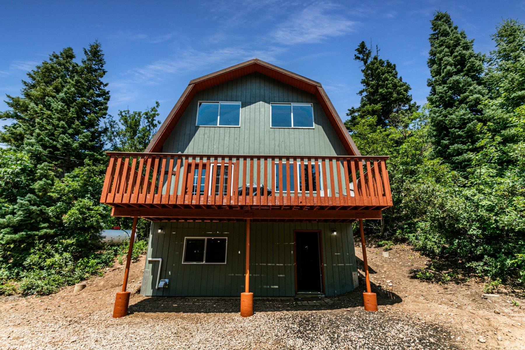 Escape to the peace and beauty of this charming 4-bedroom, 2-bath cabin nestled on a private half-acre wooded lot in the quiet hills of Midway. Surrounded by mature trees and tucked away on a secluded dirt road, this property offers the perfect balance of privacy and relaxation. The recently remodeled lower level adds updated comfort and modern touches, while the home is being sold fully furnished and ready to enjoy from day one. Spacious driveway provides ample parking for guests, trailers, or recreational vehicles, making this the perfect year-round retreat or mountain getaway.
