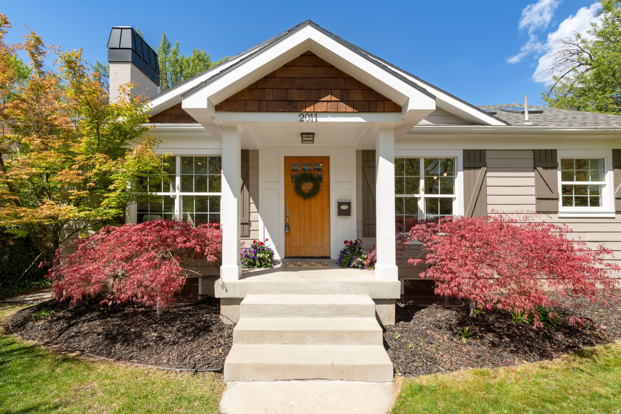Substantial Price Improvement:  NOW $999,000!  This charming cottage exudes curb appeal, character, and charm. Ideally located in a very sought-after neighborhood between Emigration Market and Jolley's Corner, Crema, and Foothill Village. Thoughtfully designed to maximize every square foot, the home features an open floor plan with abundant natural light, an updated kitchen, beautiful cherry hardwood floors, and a cozy fireplace. The main level includes two bedrooms and a nicely renovated full bath, along with direct access to the attached two-car garage, partially covered patio and access to the backyard. Major updates include newer windows, plumbing, electrical, solar panels and sprinklers. The basement offers a spacious family room with large windows and a gas fireplace, two additional bedrooms, an updated full bath, and a laundry room. Enjoy the large fully fenced private yard with mature landscaping, garden boxes, playset, spacious stone patio, pergola, and shed. Conveniently located within walking distance to amazing dining, shopping, parks, and top-notch schools, and just minutes from the University of Utah, downtown Salt Lake, freeway access, and multiple canyons for year-round recreation and world-class skiing.