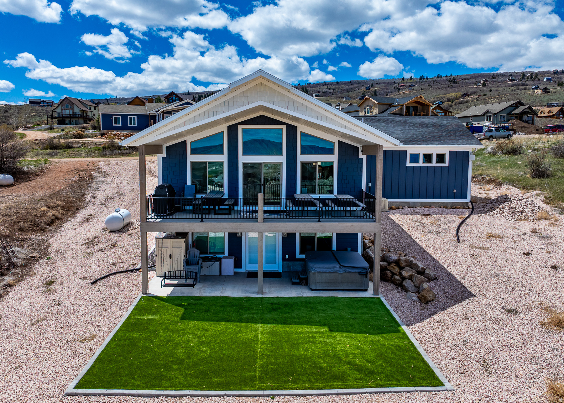 NIGHTLY RENTAL IN BEAUTIFUL BEAR LAKE!  Fully stocked  "Turn Key"  rental!  Relax in the Bullfrog spa or on the covered deck and enjoy the beautiful view of Bear Lake and the mountains and the pleasant summer nights!  Spacious great room and family room perfect for entertaining!  You must see inside!     Square footage figures are provided as a courtesy estimate only .  Buyer is advised to obtain an independent measurement.