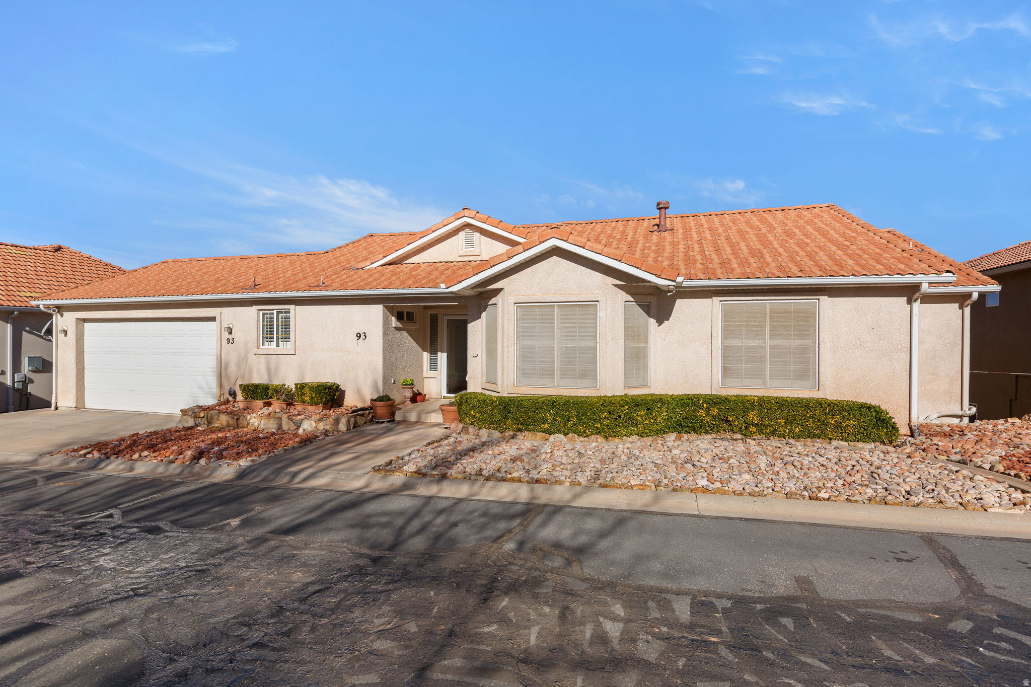 Another $10,000 price reduction! Original Owner was in love with the view! This outstanding view is picturesque showing the mountains and valley throughout this well-maintained and loved home. Mrs. Clean lived here. Features include 4 bedrooms, 3.5 baths, jetted tub, oversized garage, 3 patio areas to enjoy mother nature and the views, roomy basement living for friends and family to visit with an outside entrance and more. Located in a 55+ community with low HOA monthly dues of $108 which includes great amenities, indoor pool, exercising area, clubhouse, outdoor activities, private road and more. Close to Washington County recreation center, many trails, shopping, restaurants and the freeway.