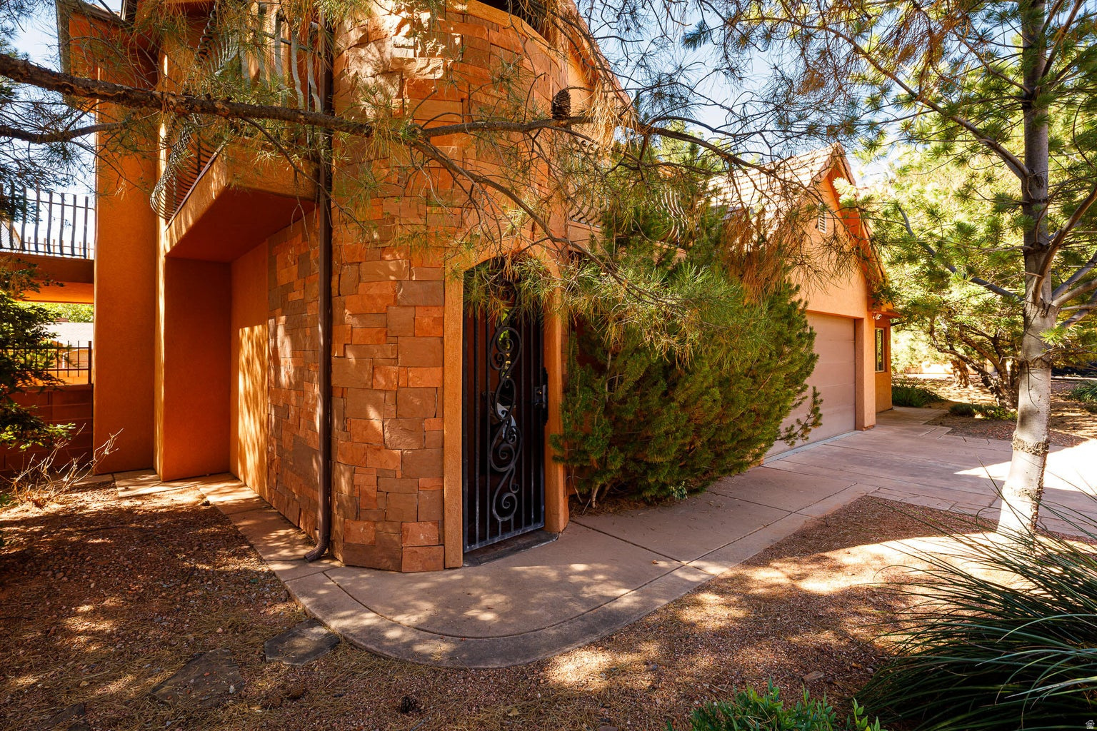 This beautiful home is set against the dramatic red cliffs and designed for both elegance and comfort. It has a bonus ADU/Casita as well. The homes inviting entry opens to a refined interior featuring formal living area with a fireplace, 3 bedrooms and 2.5 baths. A formal dining room with bay windows leads into the well-equipped kitchen, complete with abundant storage, newer appliances, and a pantry. The laundry room includes an upgraded washer and dryer with small-batch drawer for added convenience. Upstairs, the spacious primary suite offers a cozy fireplace, ensuite bath, and balconies with breathtaking views. An additional bedroom, full bath, and a versatile family/exercise room complete the second level. A highlight of this property is the private ADU/Casita with its own entrance, kitchenette/studio space, and  bath-perfect for guests, extended family, or income potential. Located in La Estancia, a premier subdivision known for its community amenities and unmatched setting at the mouth of the red rocks, this home blends style, function, and lifestyle in one. Community Amenities are amazing home is near the pool. Call for your private tour. Buyer to verify all details.