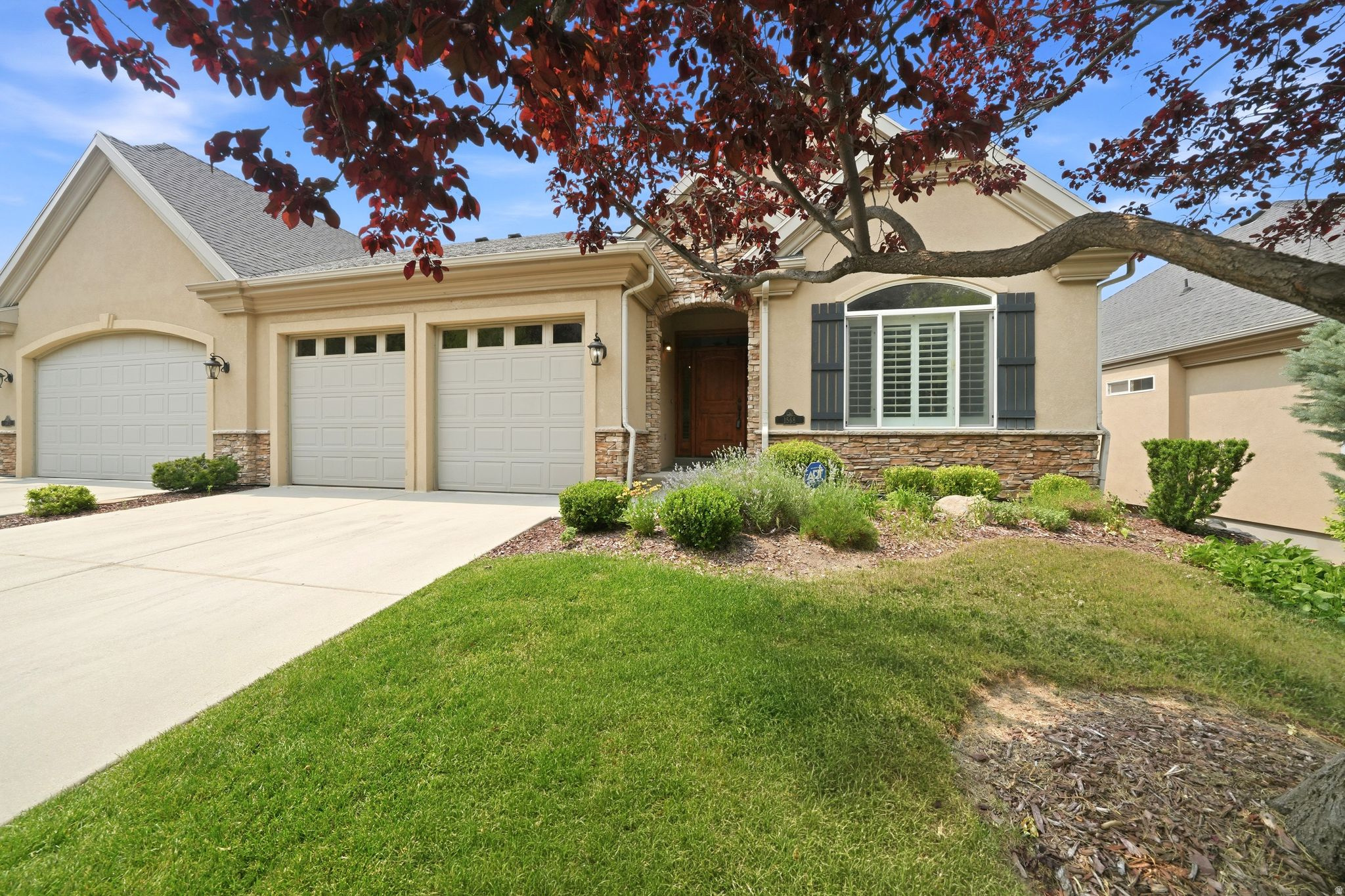 Nestled on a quiet street in  the heart of a highly sought-after gated Draper community, this exceptional luxury townhome offers breathtaking valley views, stunning mountain vistas, and unforgettable sunsets. Enjoy the ease of maintenance-free living with access to a community clubhouse and pool, all while being surrounded by walking and biking trails. Boasting approximately 3,600 square feet, this beautifully maintained home has been completely repainted and features new carpet throughout. The thoughtfully designed floor plan offers a spacious primary suite, an additional full bath, and an elegant front room ideal for a home office or formal sitting area on the main floor. Soaring 10-foot ceilings on both levels create an open, airy feel throughout the home. The kitchen and family room open to a beautiful, covered deck, perfect for taking in the views and entertaining guests. Downstairs, the fully finished walkout basement offers two large bedrooms, a full bath, a spacious family room, and an additional finished flex room ideal for a home gym, craft room, or extensive storage. Step outside to the covered patio and fully fenced yard space, providing an outdoor retreat. All appliances are included, and major mechanical updates provide peace of mind, including a new water heater, furnace, air conditioner, steam humidifier, refrigerator, washer, and dryer-all replaced in 2023 and 2024. Conveniently located just minutes from freeway access, shopping, dining, and everyday amenities, this move-in-ready home combines luxury, comfort, and convenience in one of Draper's most desirable communities. Easy to show. Call for your appointment.    Square footage figures are provided as a courtesy estimate only and were obtained from  county records.  Buyer is advised to obtain an independent measurement.